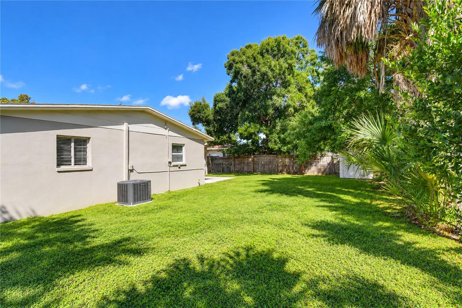 Enjoy the flexibility and comfort of a spacious backyard. - 4508 S LOIS AVE, TAMPA