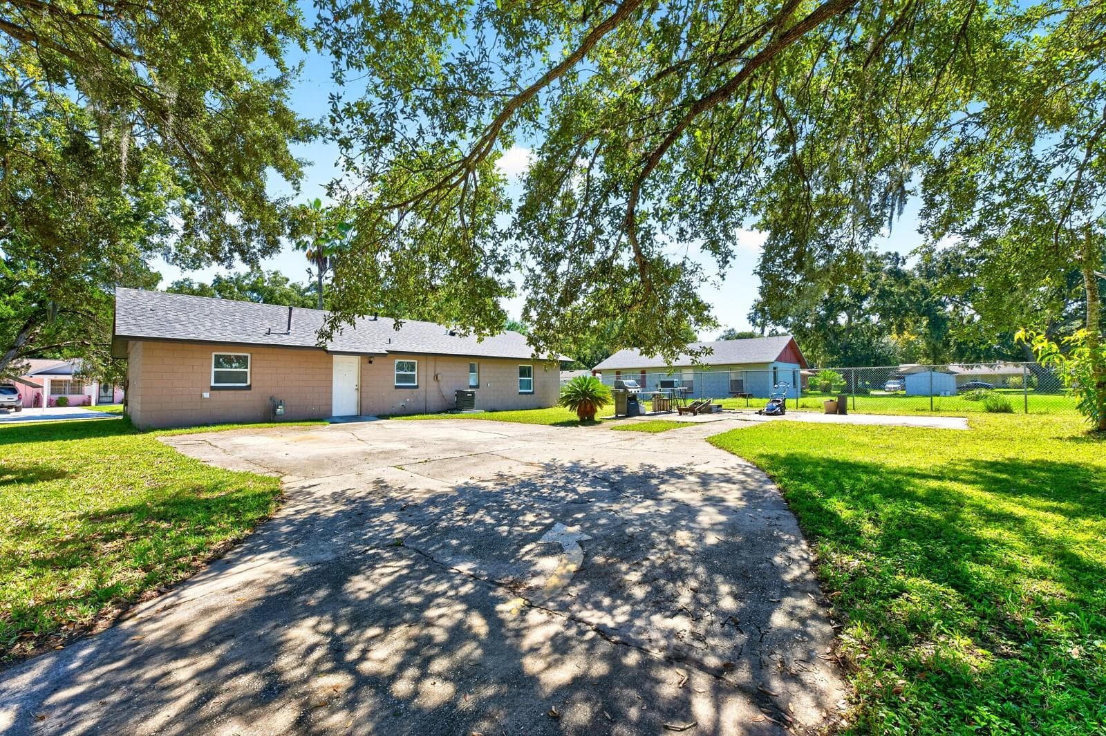 The Kitchen provides access to the backyard, where there's an OPPORTUNITY to create an outdoor space that reflects your own style. - 1444 KENNY CT, WINTER GARDEN