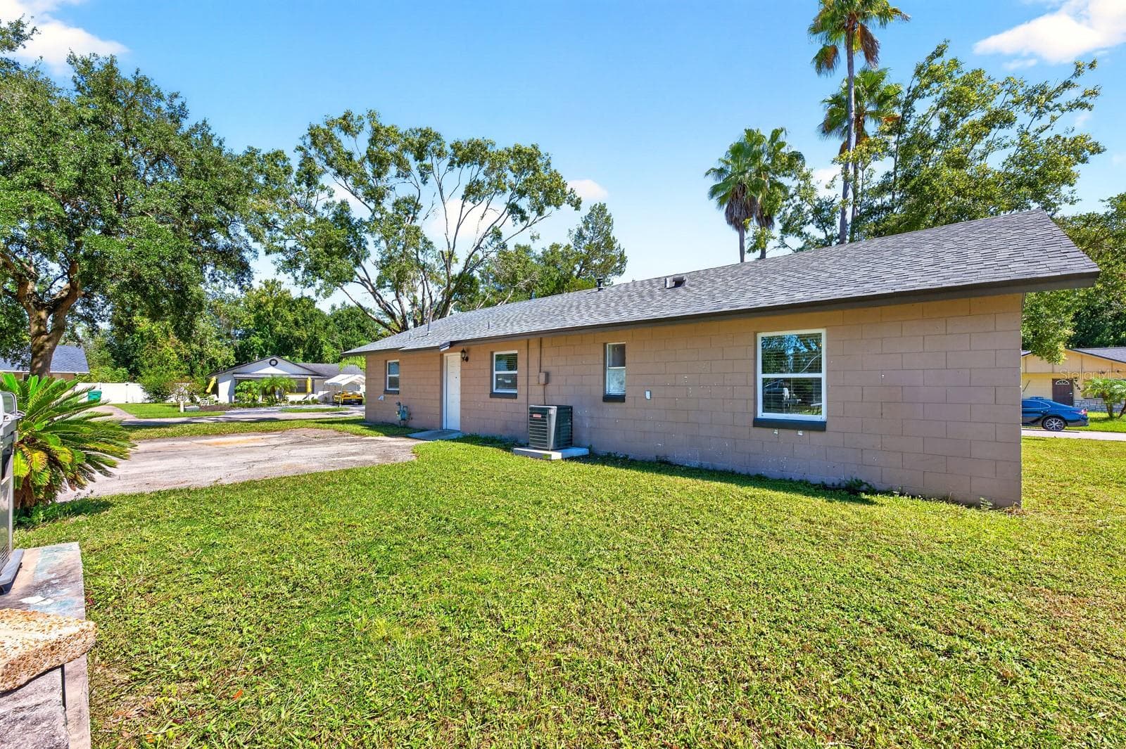 The Kitchen provides access to the backyard, where there's an OPPORTUNITY to create an outdoor space that reflects your own style. - 1444 KENNY CT, WINTER GARDEN