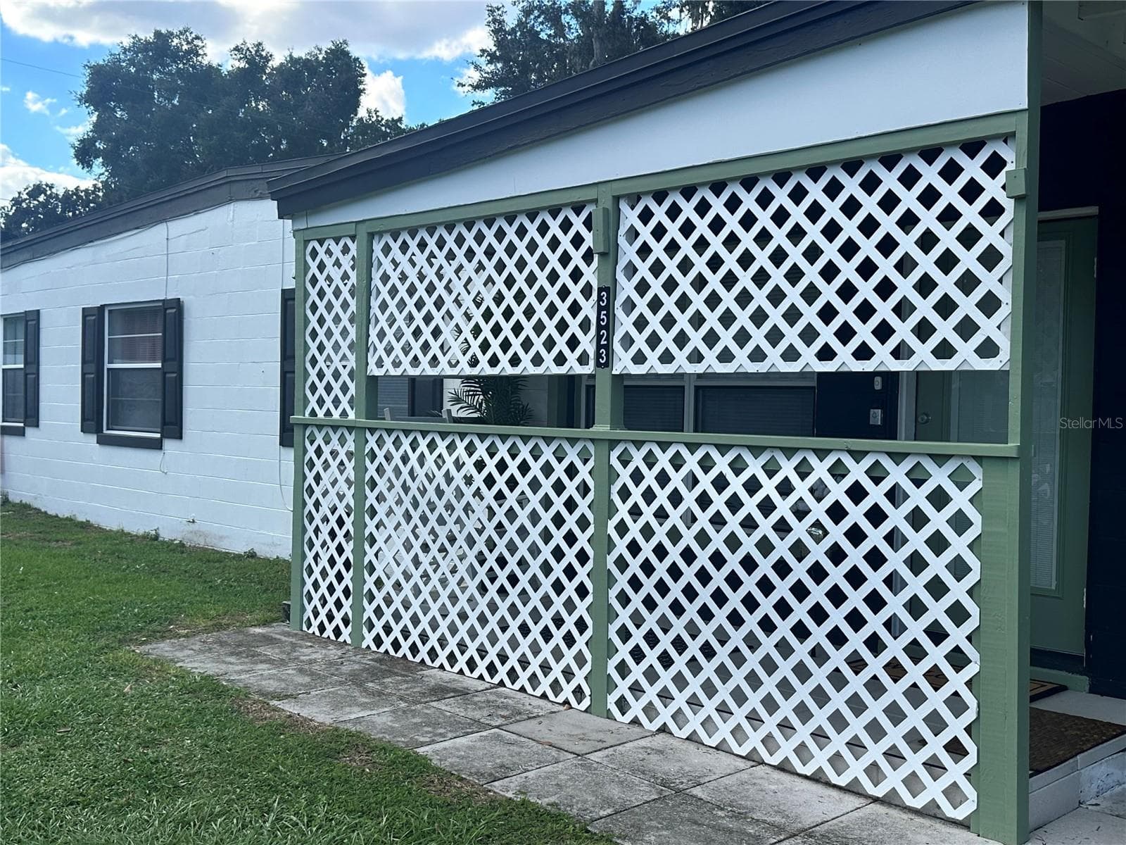 Newly painted trim on lattice - 3523 SE 6TH ST, OCALA