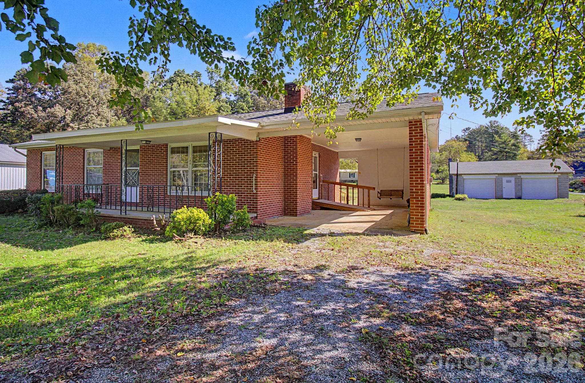 Attached carport with  a no-step entry ramp - 188 Pinner Road, Arden