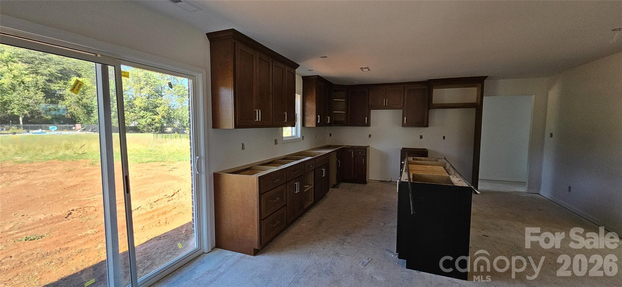 Kitchen/dining room coming in from laundry room - 3684 Woodgreen Drive, Lincolnton