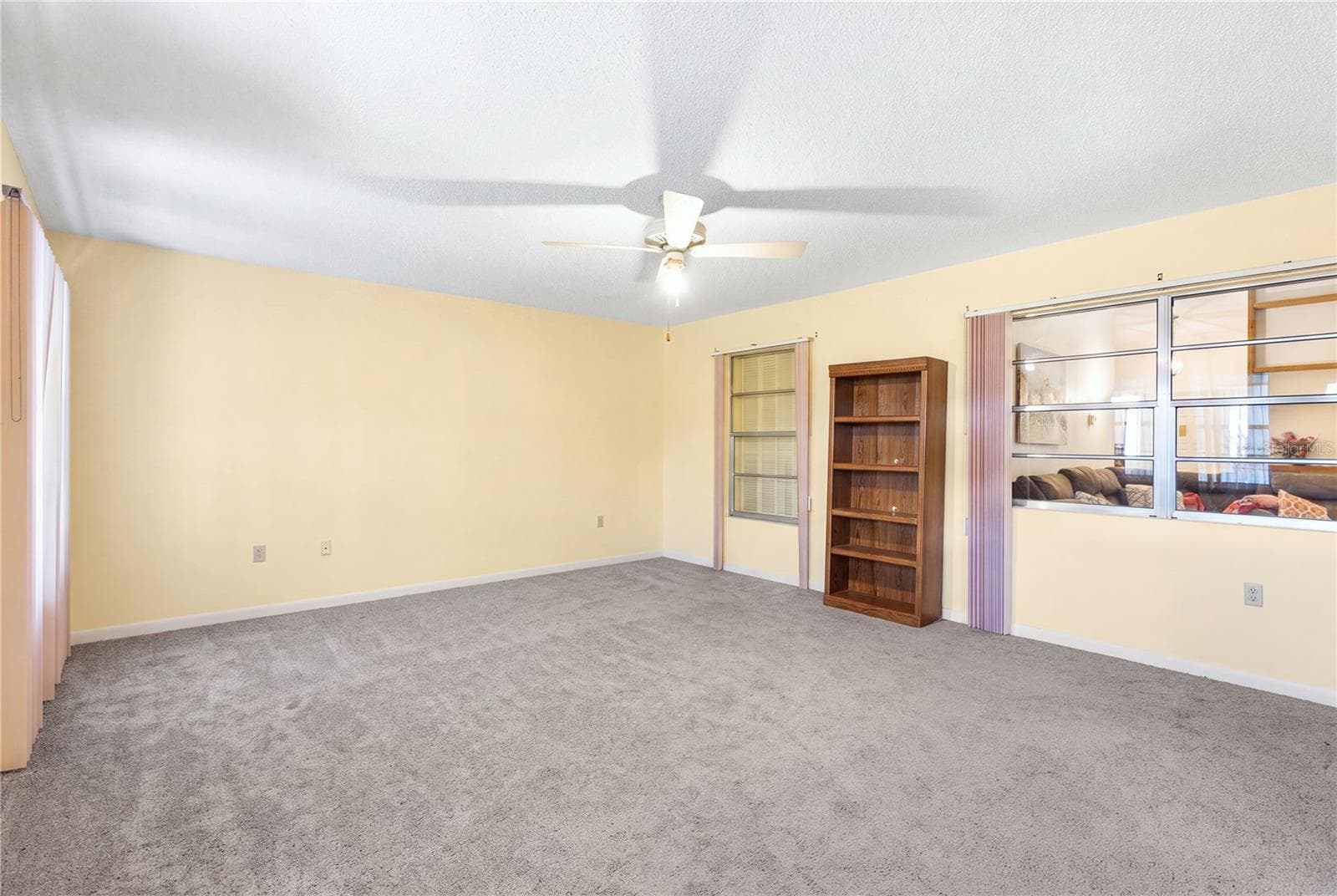 bonus space located in the rear of the home - 7418 RIVERBANK DR, NEW PORT RICHEY
