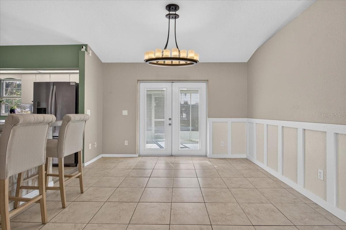French doors out to back porch. - 10687 SW 74TH TER, OCALA