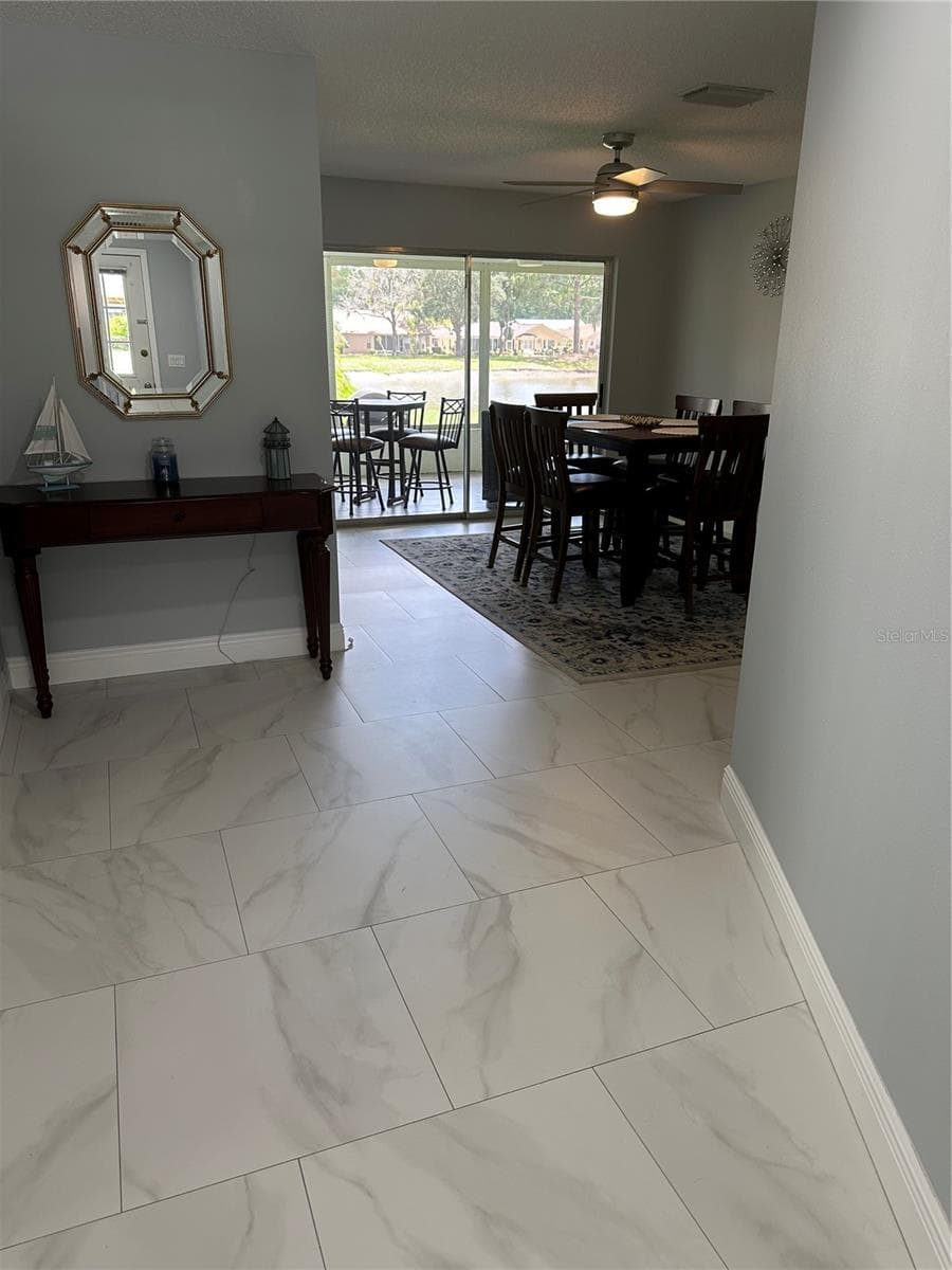 Single Family Residence at 9908 SAINT JOSEPH CT, NEW PORT RICHEY, photo 6 of 32