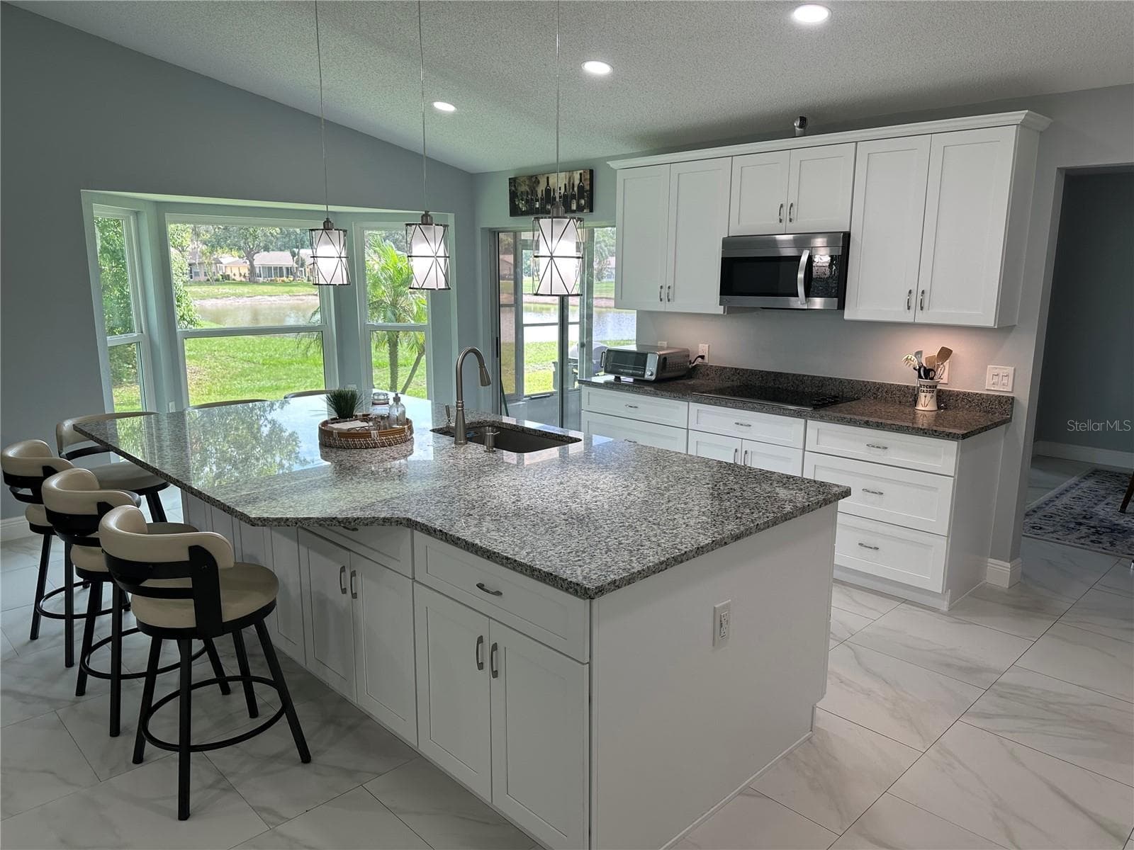 Single Family Residence at 9908 SAINT JOSEPH CT, NEW PORT RICHEY, photo 10 of 32