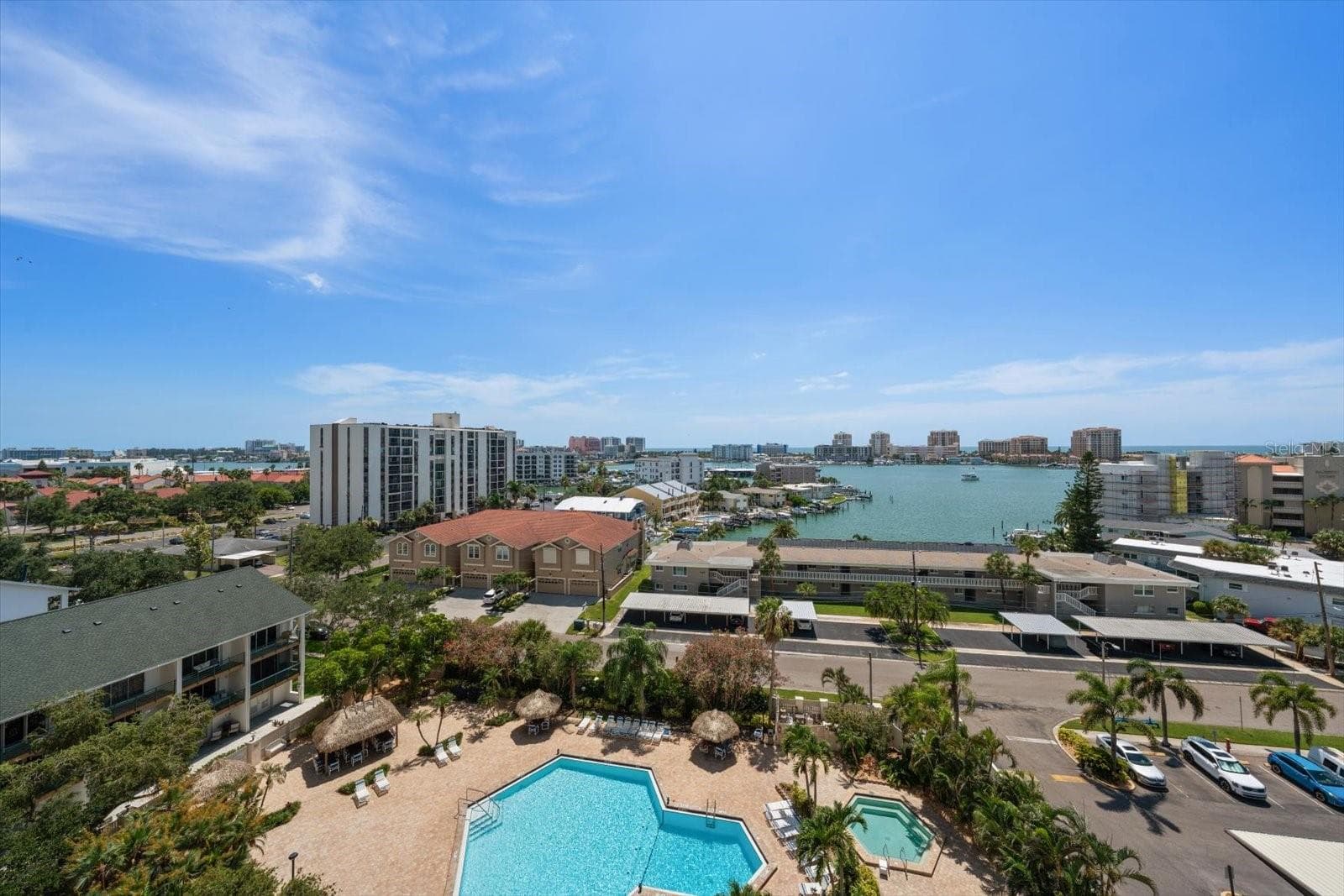 Soak in the scenery from your balcony overlooking the resort style pool! - 400 ISLAND WAY #904, CLEARWATER BEACH