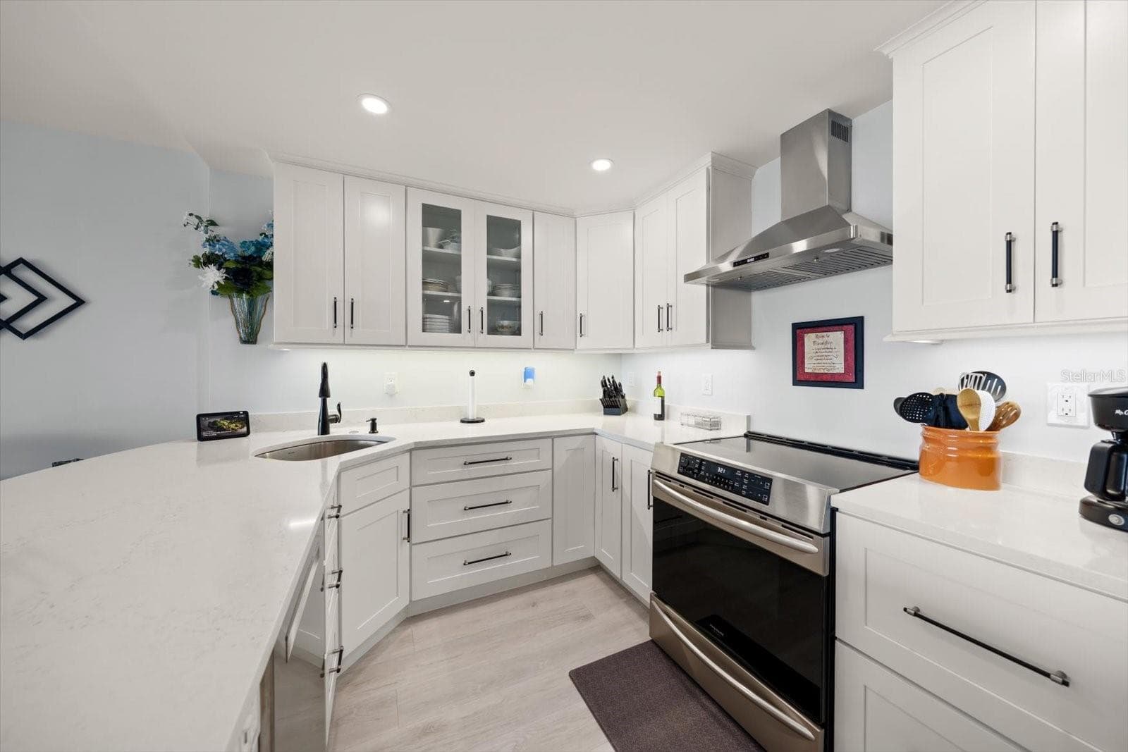 Well appointed kitchen with oversized island; perfect for dining & entertaining. - 400 ISLAND WAY #904, CLEARWATER BEACH