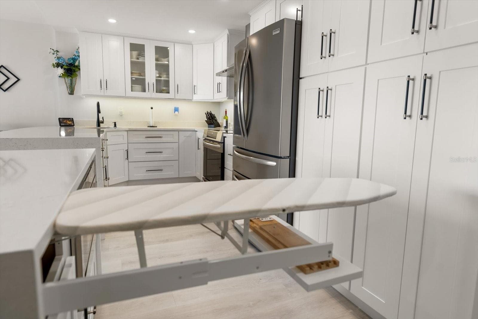 Built in Ironing Board that neatly tucks away. - 400 ISLAND WAY #904, CLEARWATER BEACH