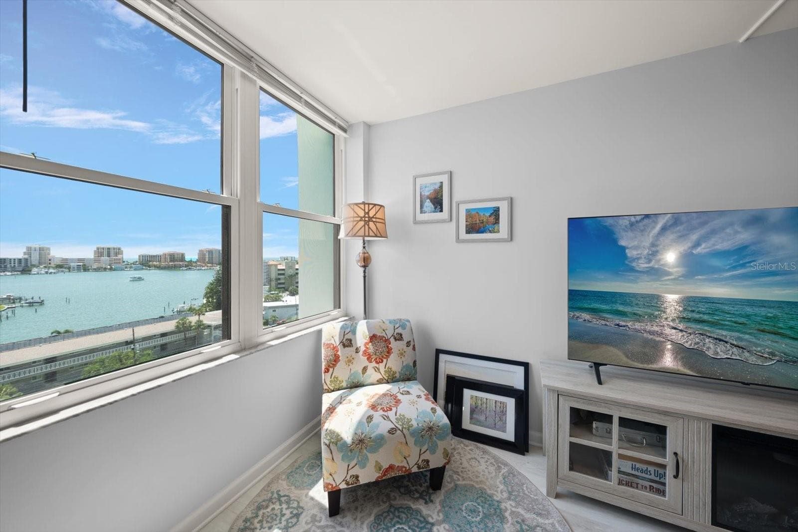 Primary bedroom is a sanctuary with stunning water views. - 400 ISLAND WAY #904, CLEARWATER BEACH