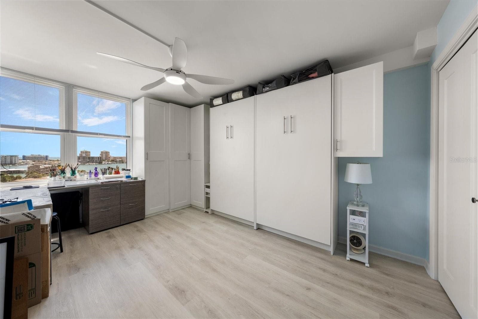 Guest bedroom featuring build in Murphy bed. Efficient option to maximize this room for additional flex space. - 400 ISLAND WAY #904, CLEARWATER BEACH