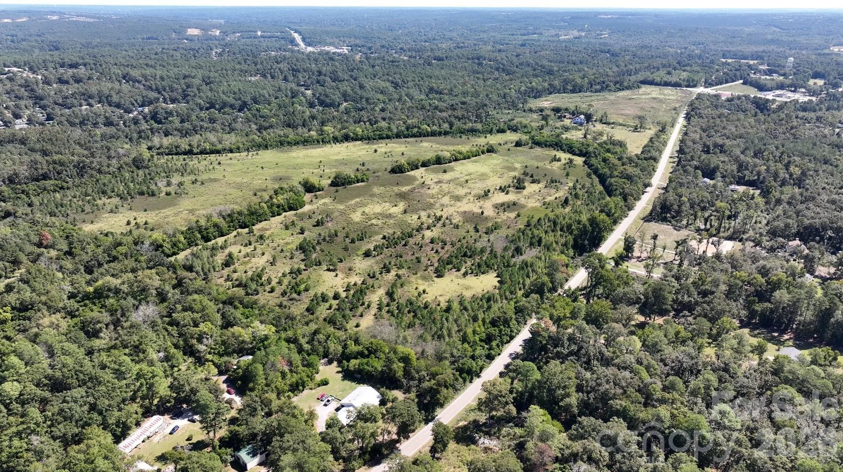 Road frontage along the property’s open fields. - 1001 Old Aiken Road, North Augusta