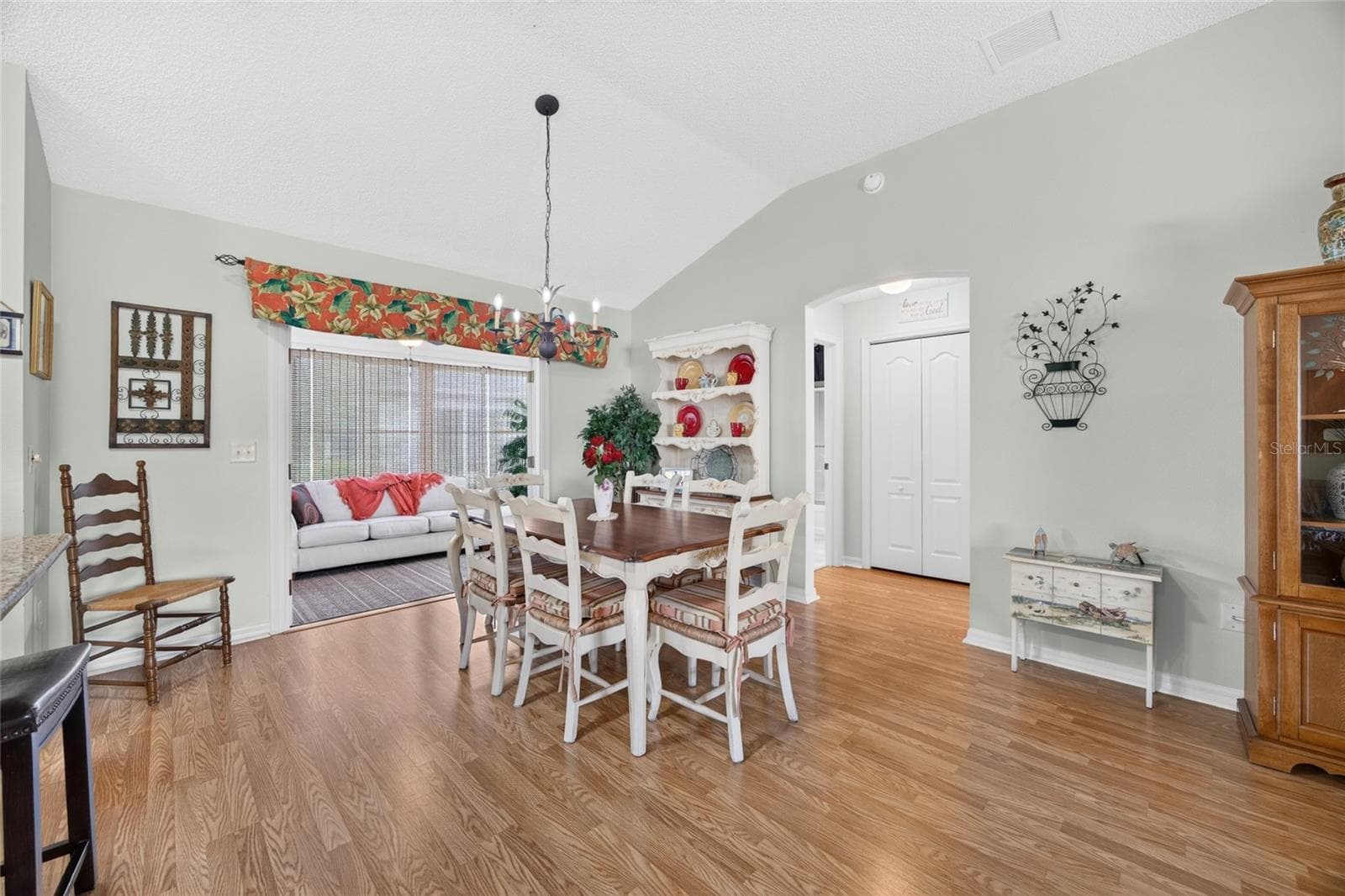 Dining Room & Opening to Enclosed Lanai - 17739 SE 89TH KEATING TER, THE VILLAGES