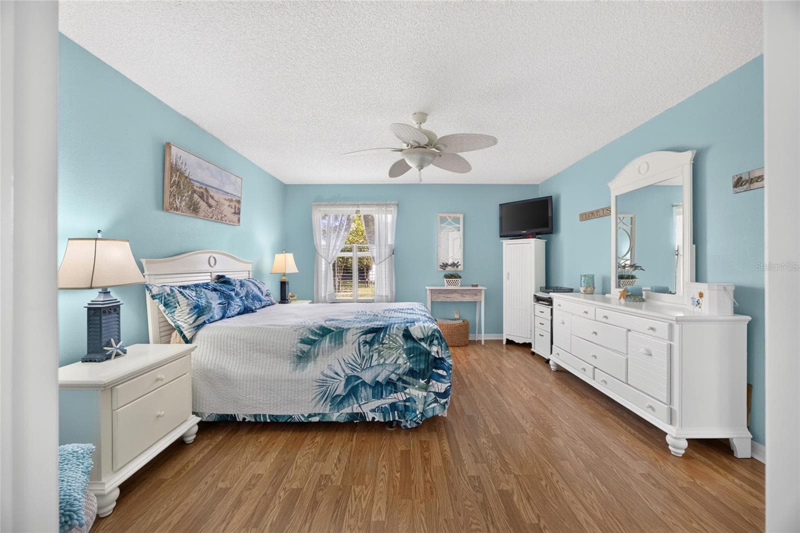 Primary Bedroom with Ceiling Fan - 17739 SE 89TH KEATING TER, THE VILLAGES