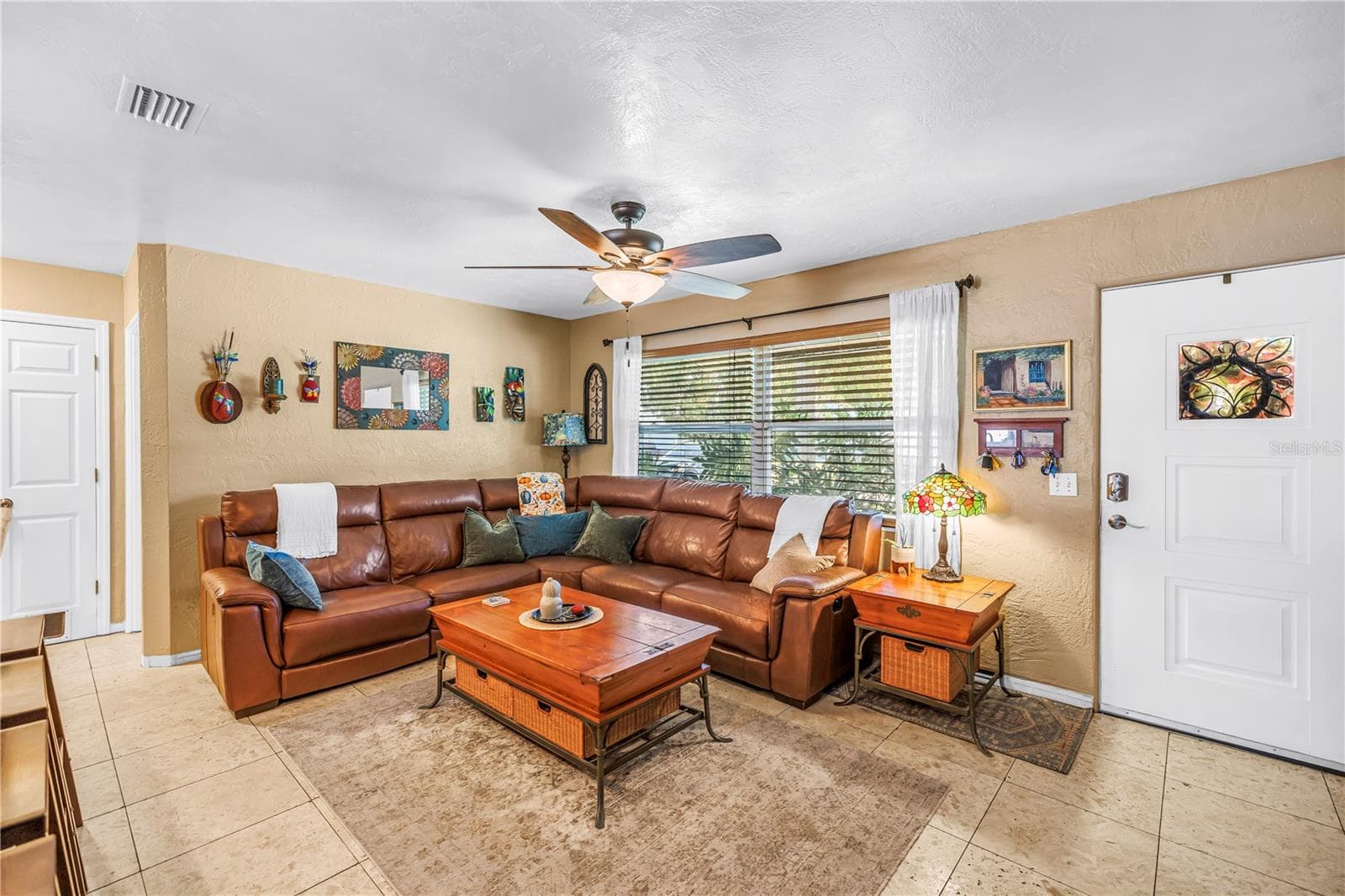 Living room inside front entry - 2573 62ND TER N, ST PETERSBURG