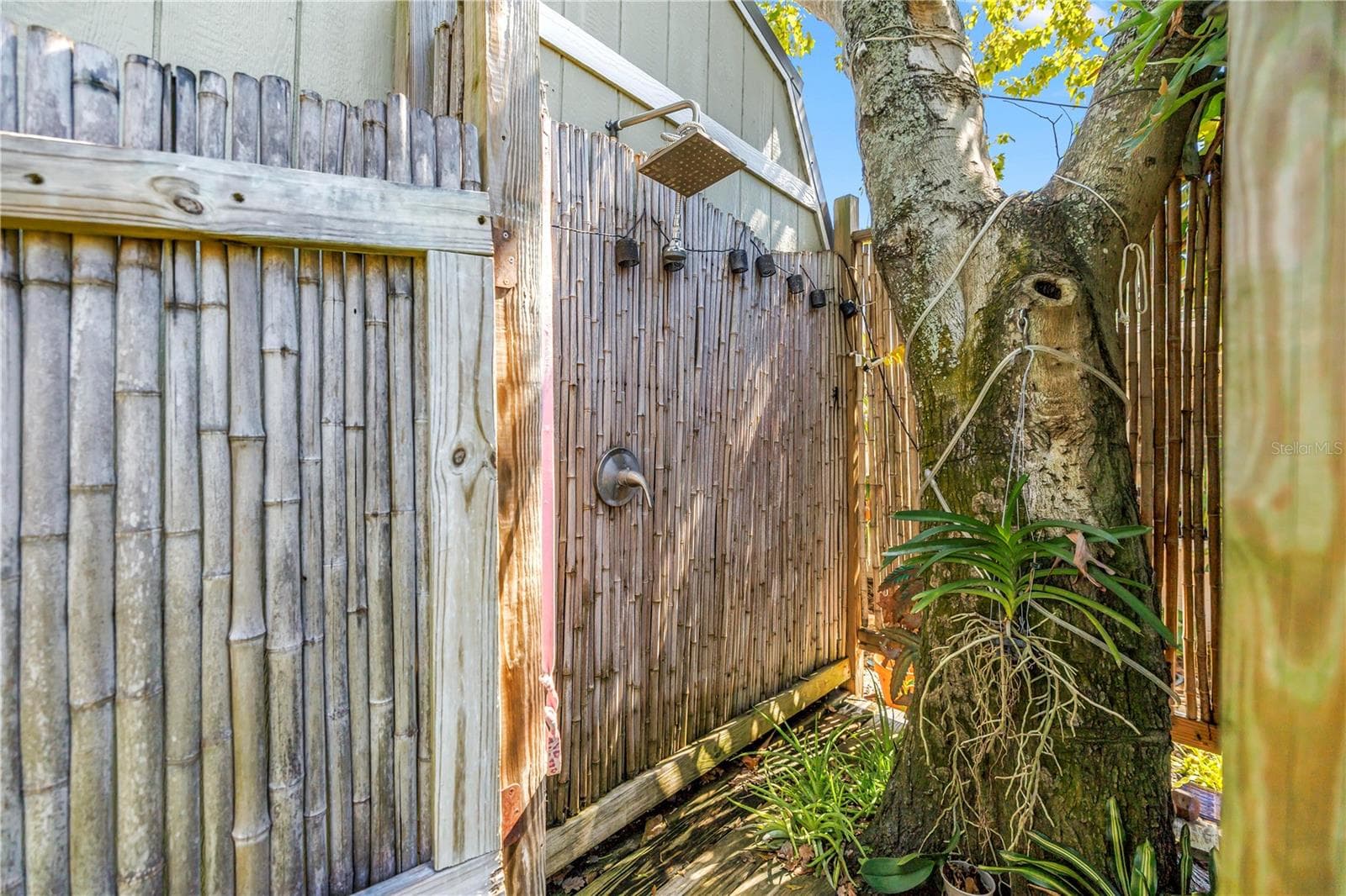 Outdoor shower with a dedicated 30GAL water heater - 2573 62ND TER N, ST PETERSBURG