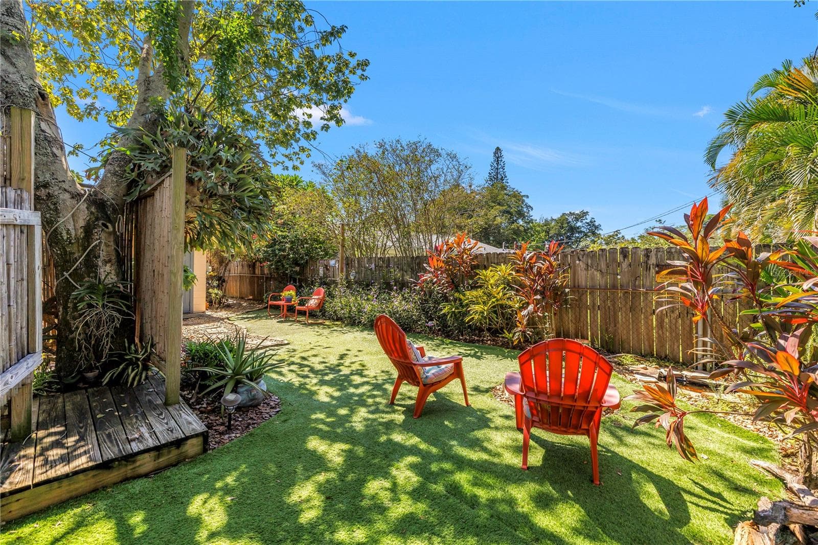 Turf throughout the backyard helps cut maintenance. - 2573 62ND TER N, ST PETERSBURG
