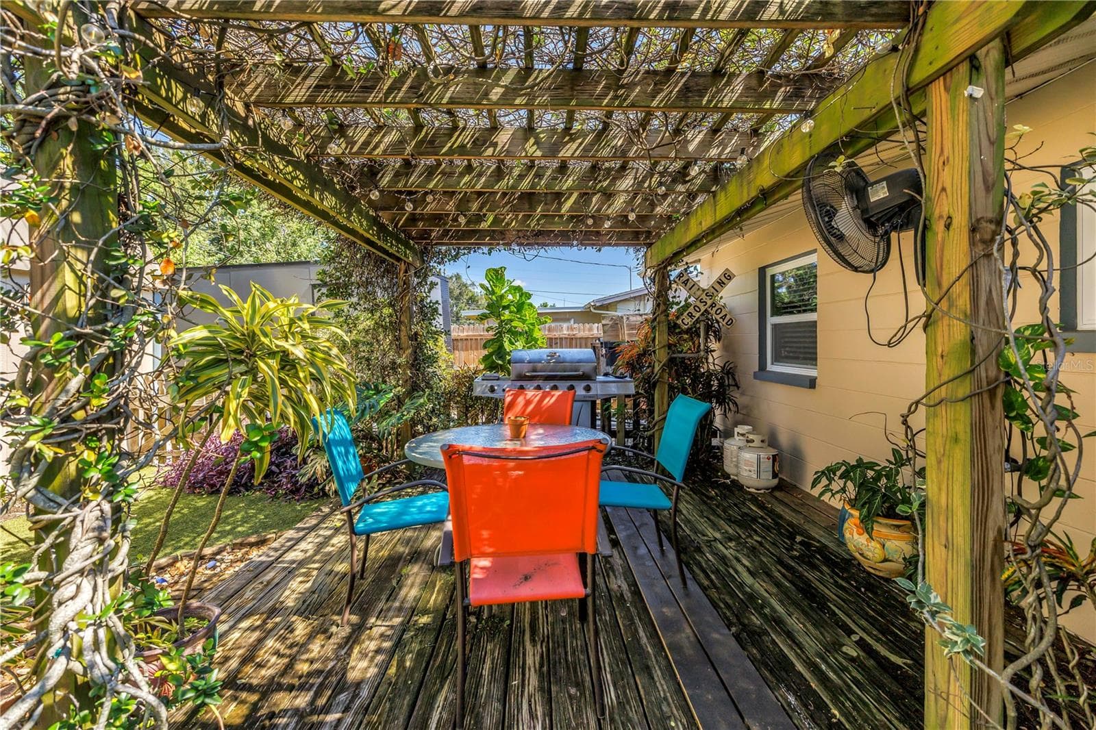 Seating for 4 and plenty of space for a large grill. - 2573 62ND TER N, ST PETERSBURG