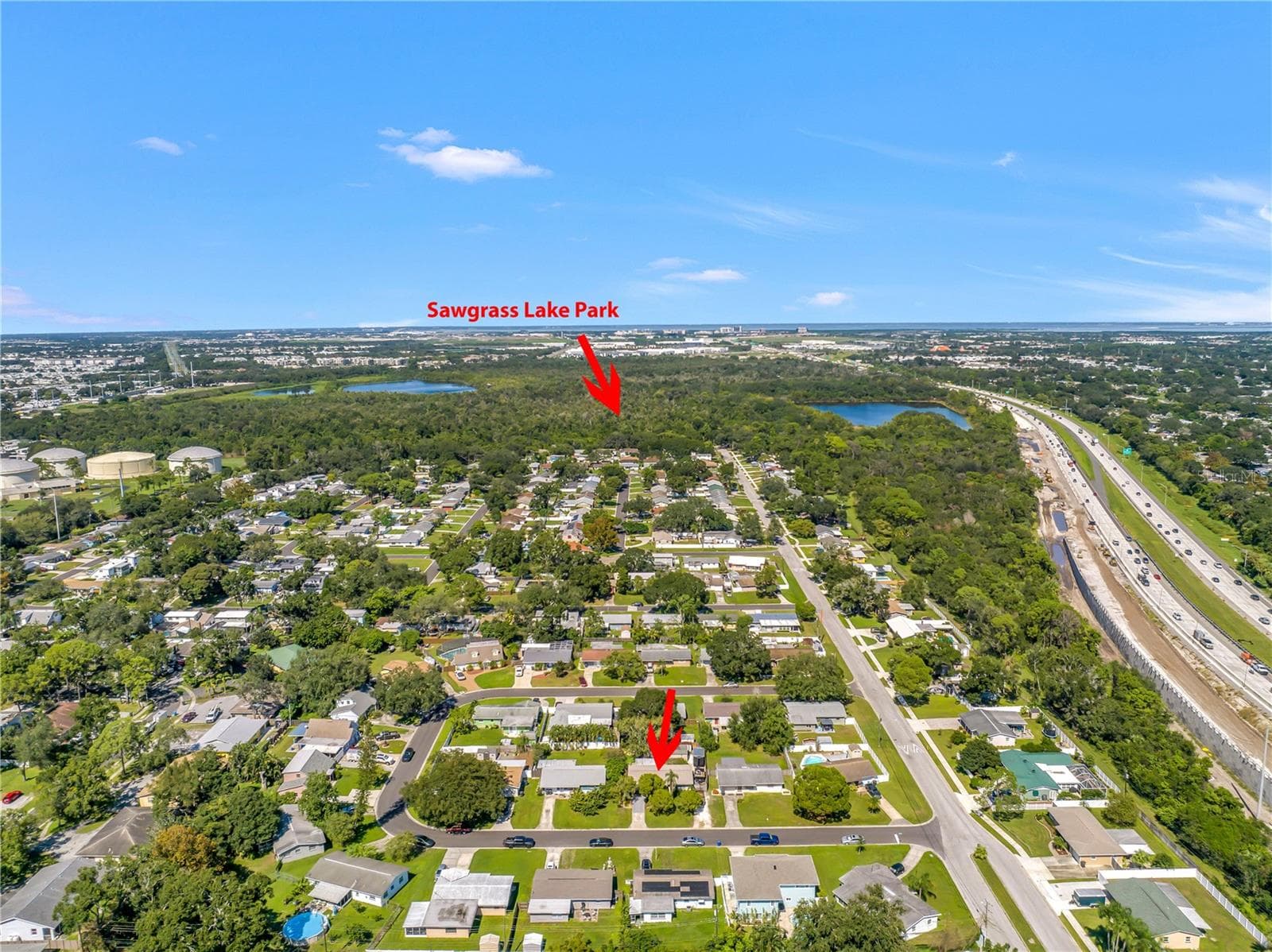 Sawgrass Lake Park's entrance is at the top of the neighborhood. It's a leisurely walk on the sidewalk to the park, often enjoyed by neighbors, with and without dogs. - 2573 62ND TER N, ST PETERSBURG