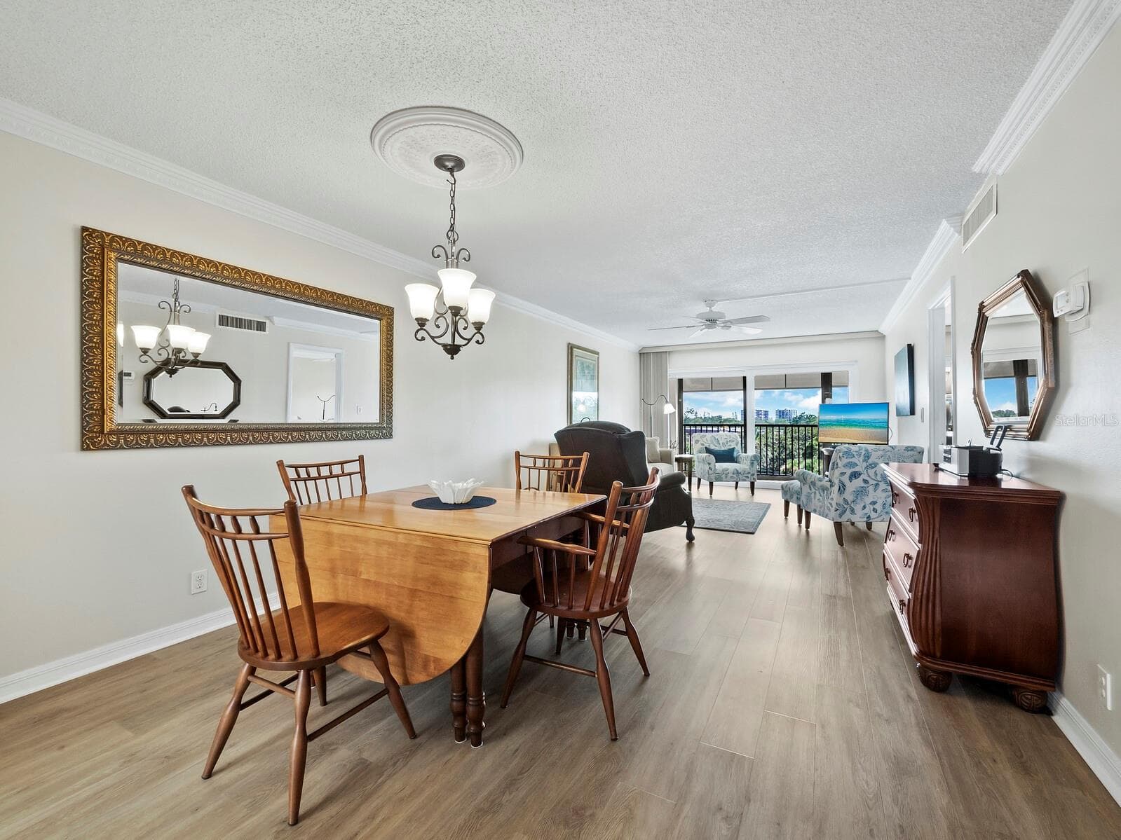 Combined dining and living room leading to the lanai - 512 W VENICE AVE #607, VENICE