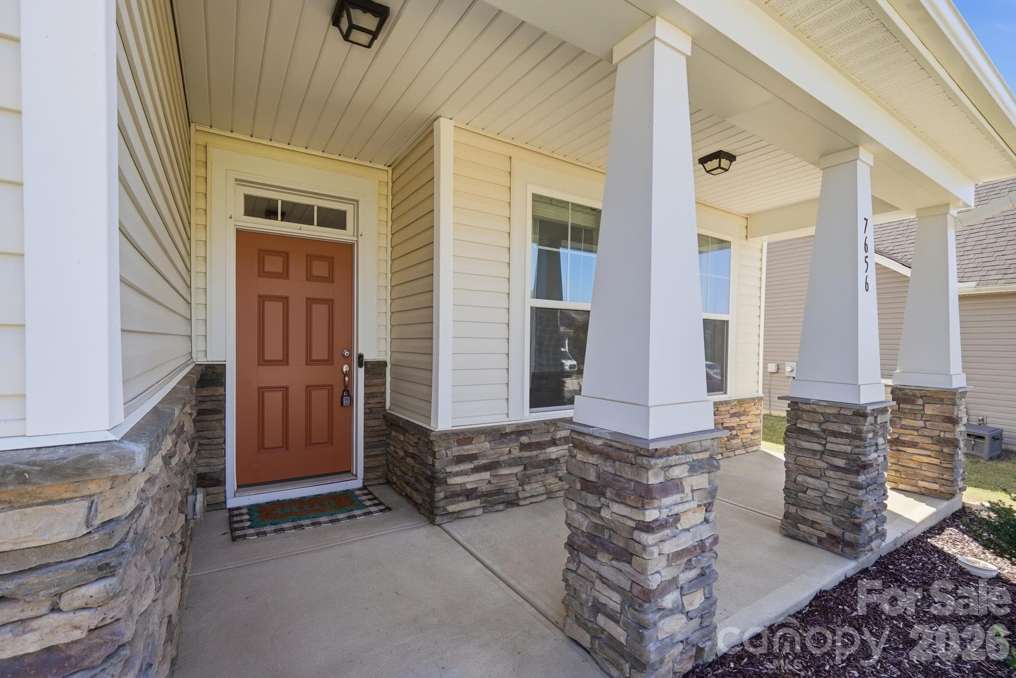 Covered front porch - 7656 Tanglewood Way, Denver
