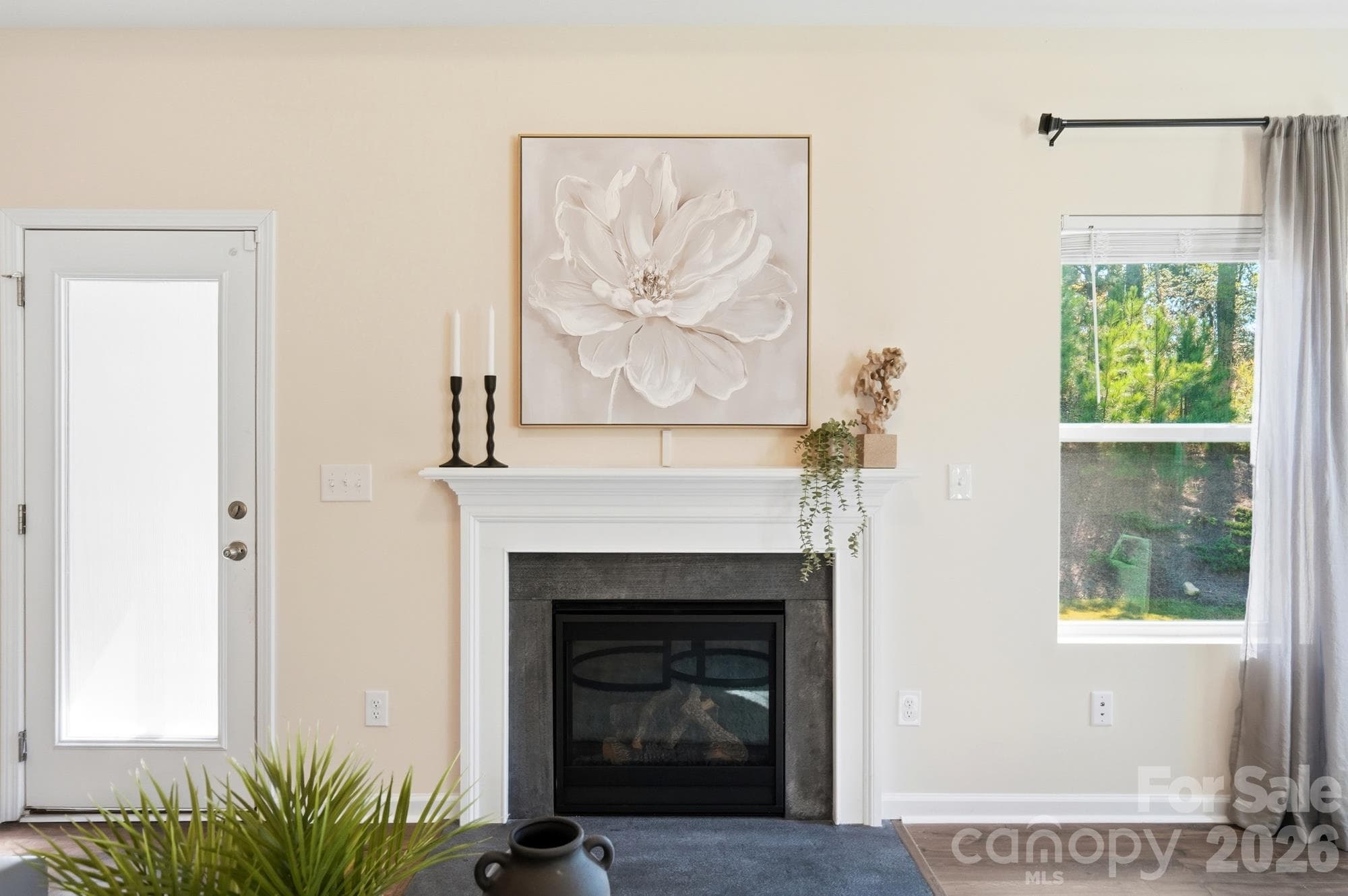 Gas fireplace in the living room - 7656 Tanglewood Way, Denver