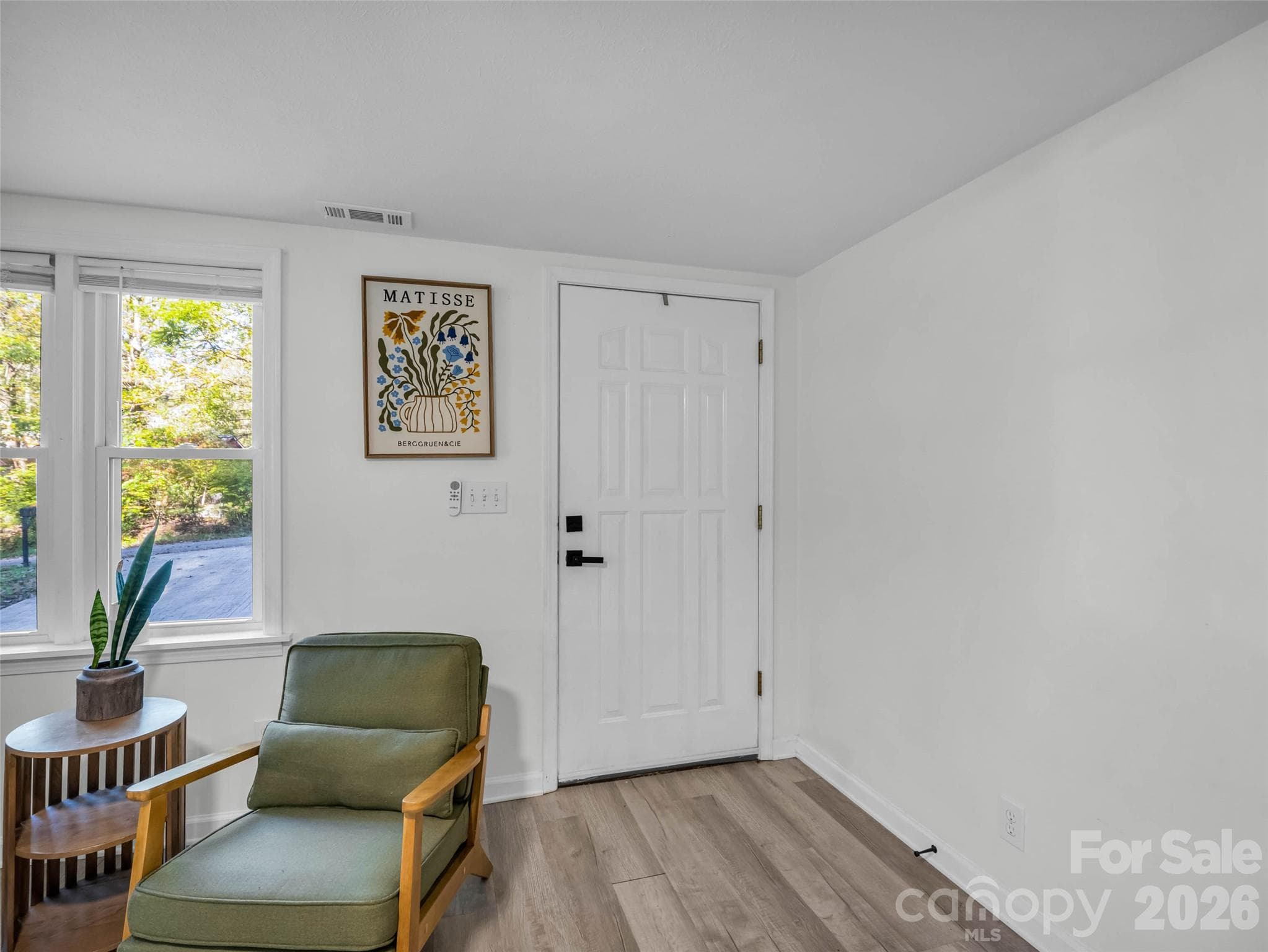 Step inside to a bright, welcoming main level. - 913 Dorothy Street, Hendersonville