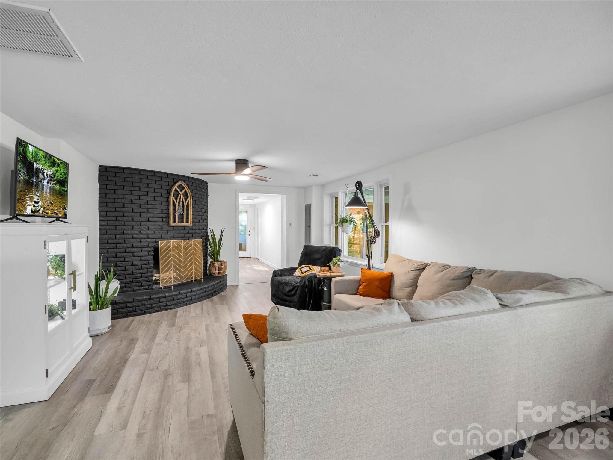 A spacious living room designed for everyday comfort. - 913 Dorothy Street, Hendersonville