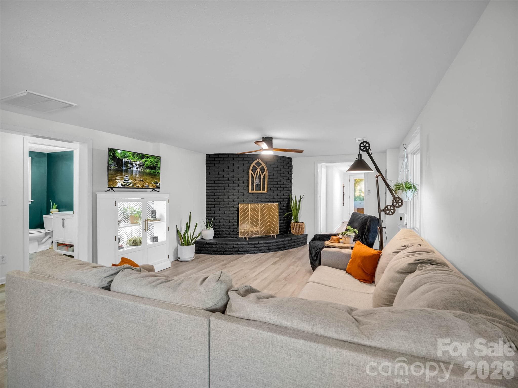 Gather around the fireplace and enjoy time together. - 913 Dorothy Street, Hendersonville