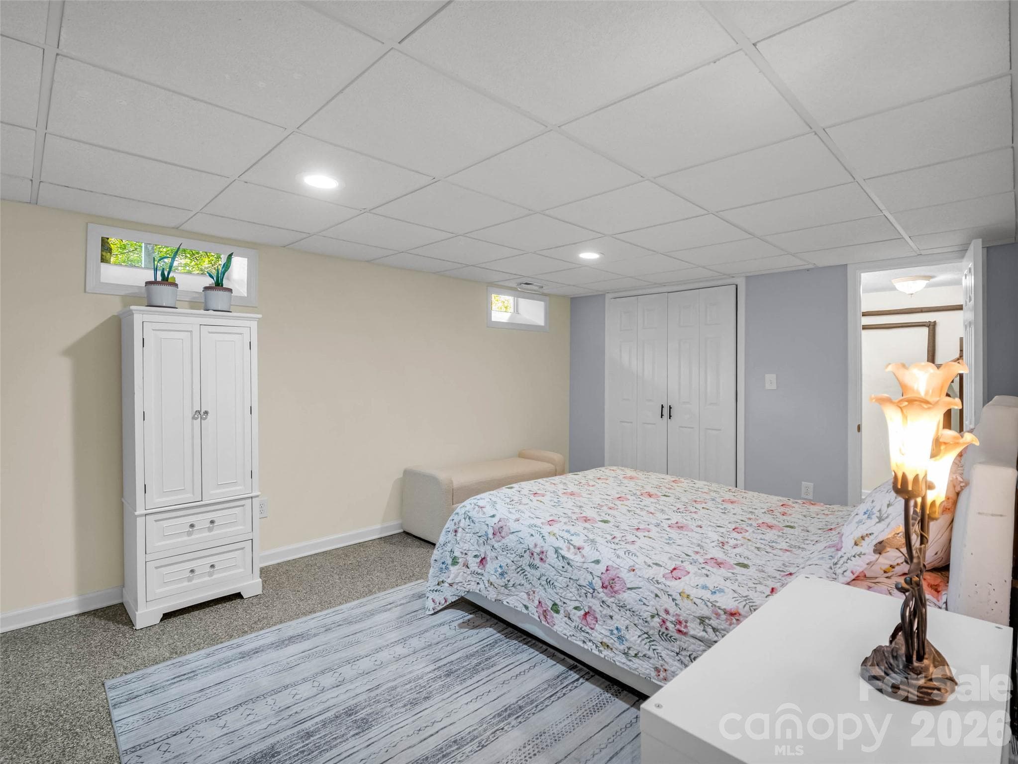 A comfortable lower-level bedroom for family or extended guests. - 913 Dorothy Street, Hendersonville