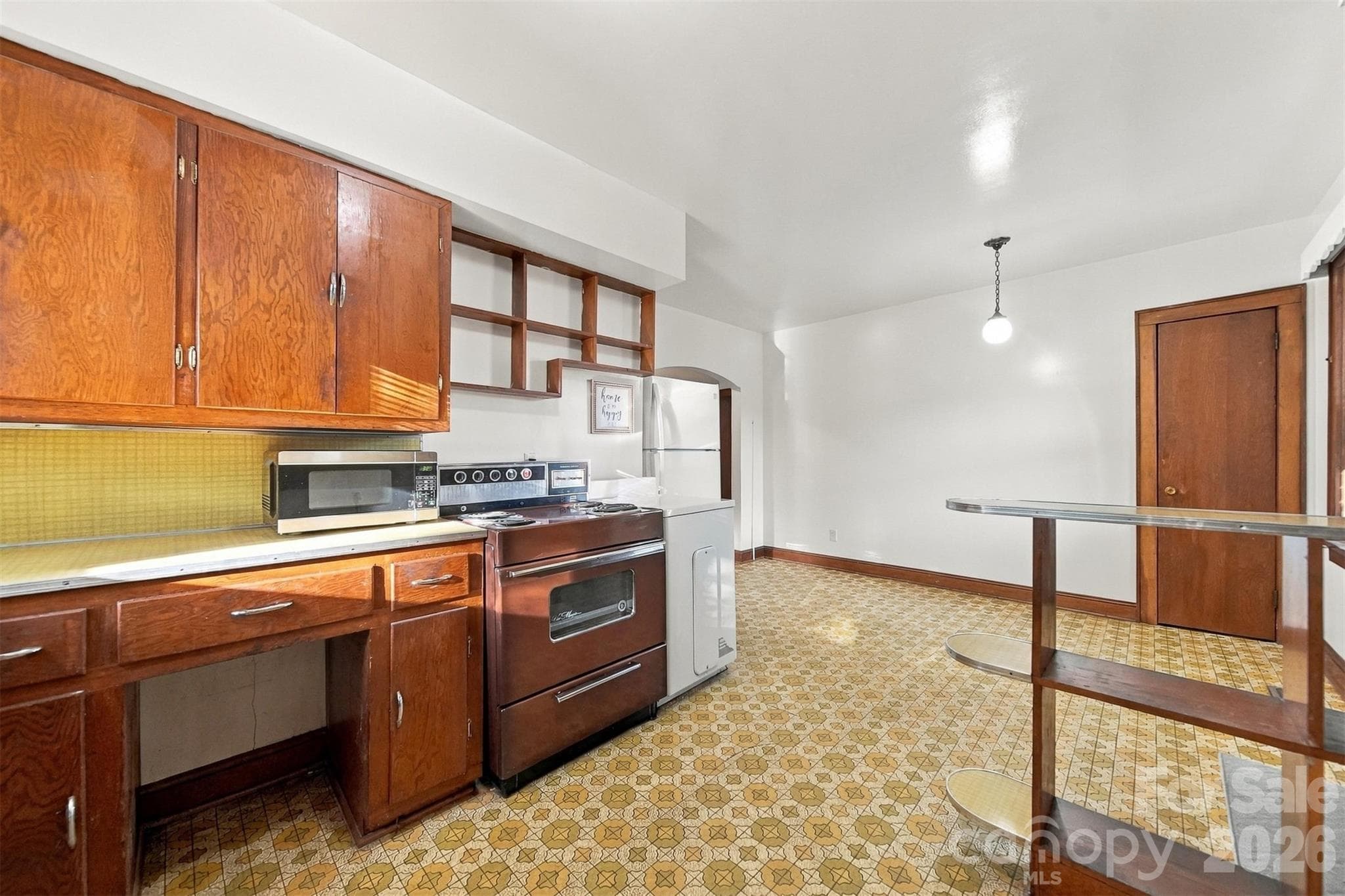 Room for your table & chairs. Also includes a pantry/broom closet. - 203 W 21st Street, Newton