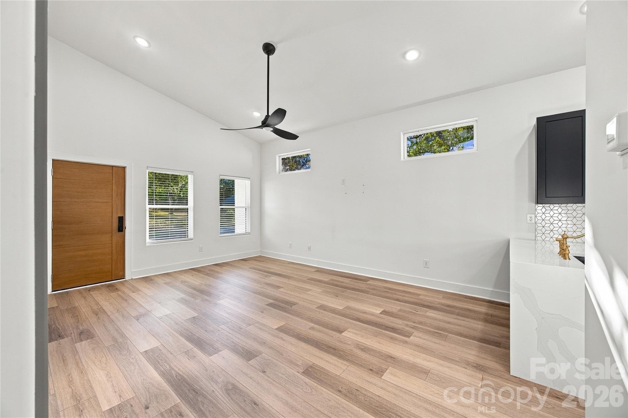 Room for a dining table, couches, and Sunday Football gatherings - 571 Buford Drive SW, Concord
