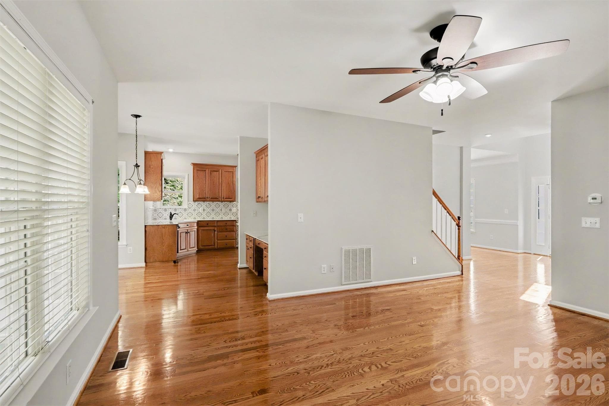 Move-In Ready Family Room! Hardwood floors, neutral paint - this is a must see! - 17028 Hampton Trace Road, Huntersville