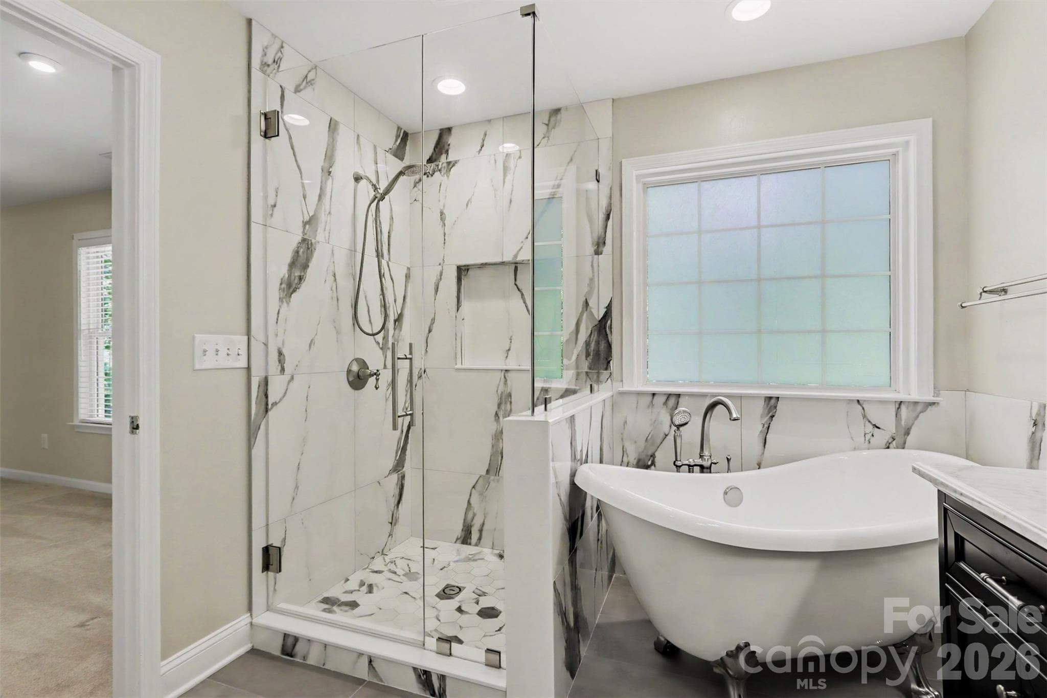 Wow! Long day at work, relax in the soaking tub or take a long, well-deserved shower! - 17028 Hampton Trace Road, Huntersville