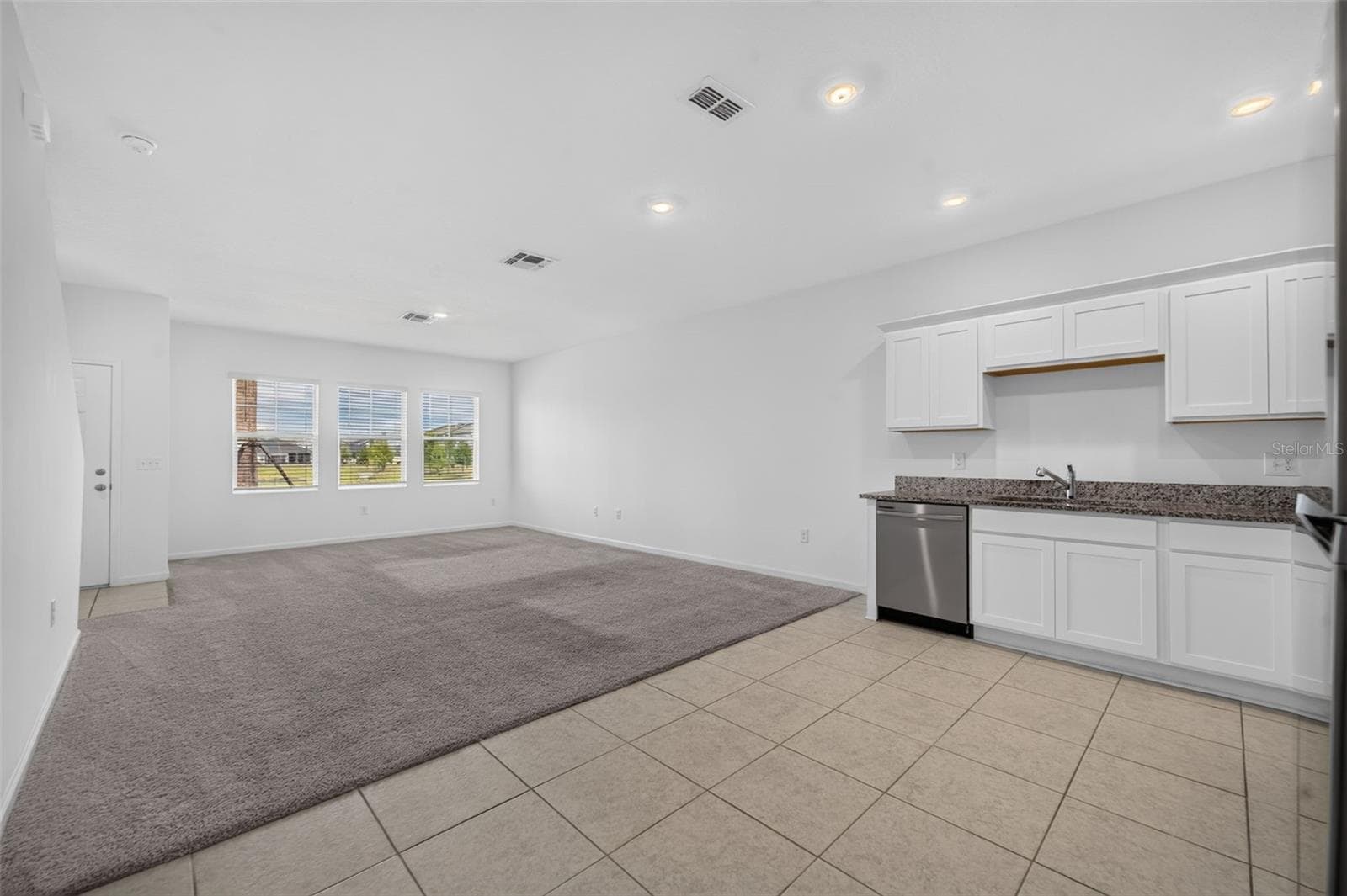 Kitchen and Dining room - 381 GRAND PINE LN, ST CLOUD