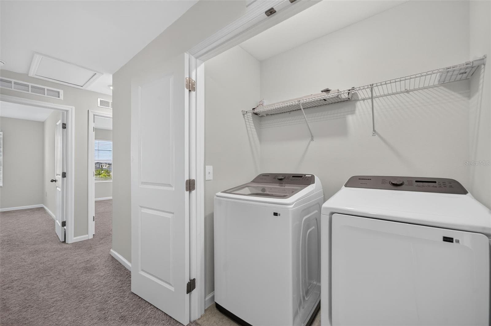 Laundry closet on 2nd floor - 381 GRAND PINE LN, ST CLOUD