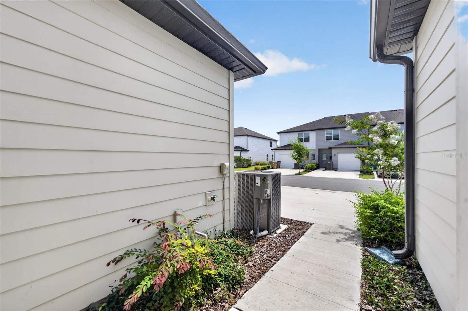 Rear Entry of townhome - 381 GRAND PINE LN, ST CLOUD