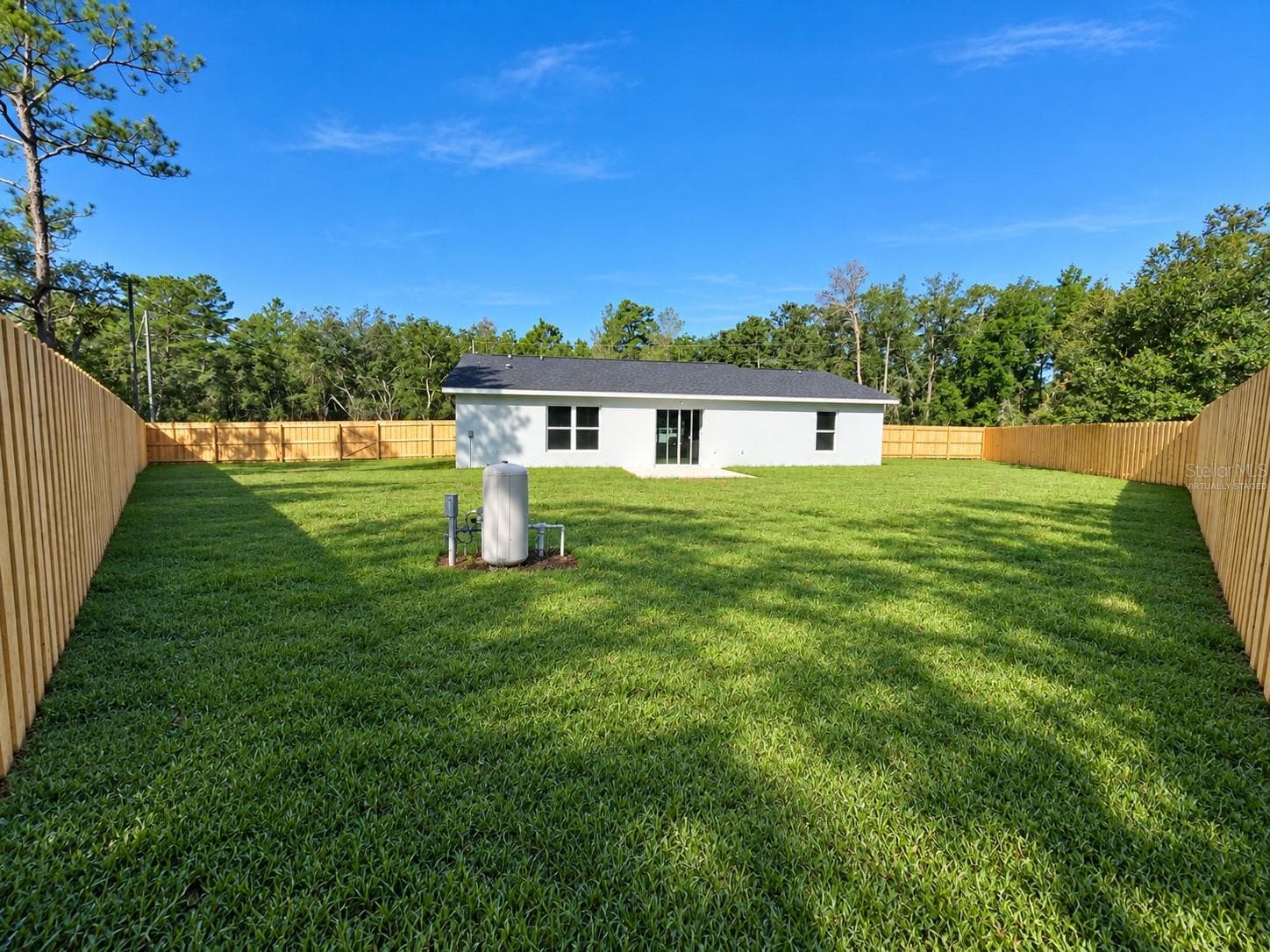 Virtually staged to show how it will look once sod grows in - 15 FISHER WAY PL, OCKLAWAHA