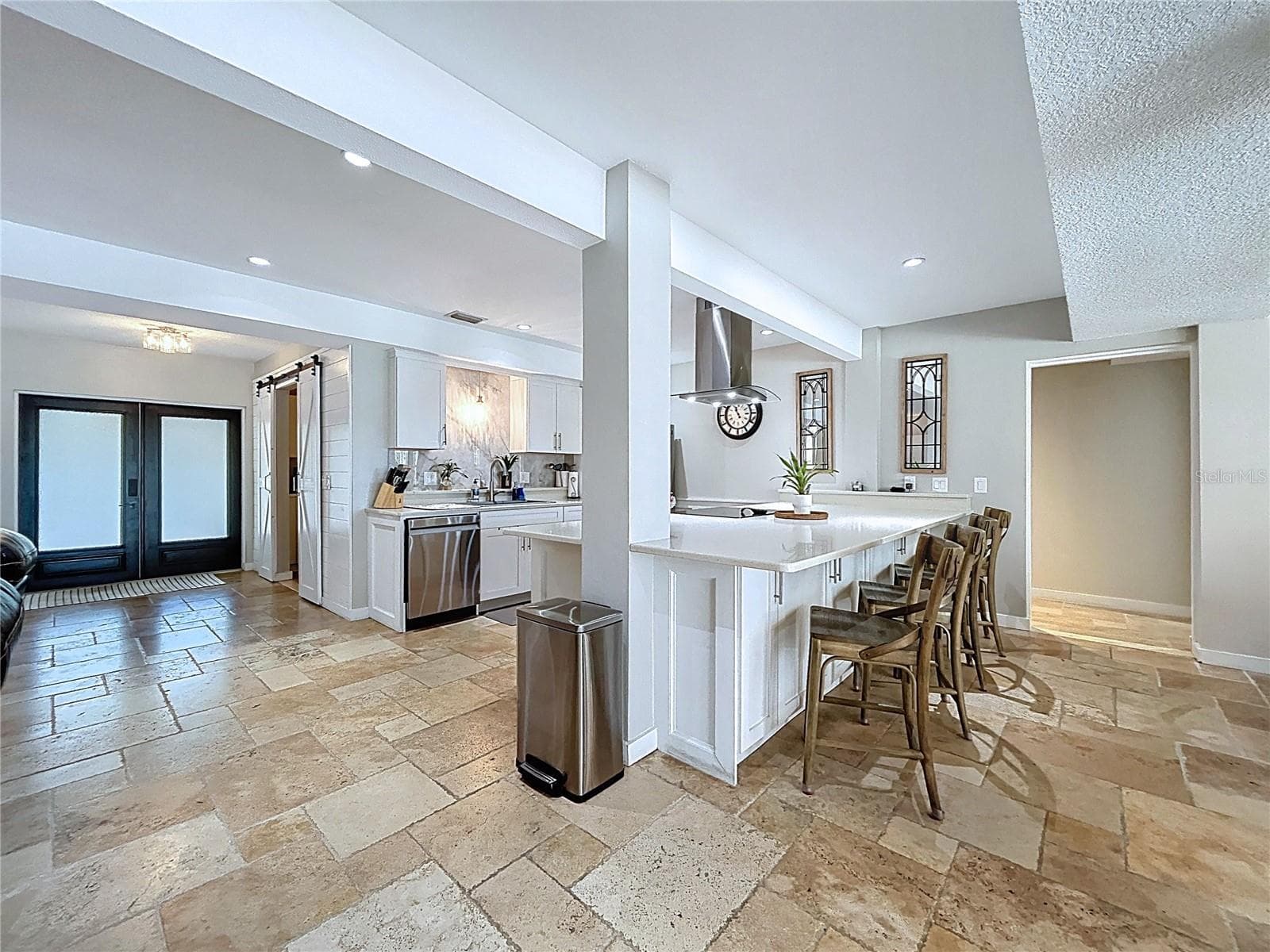 Kitchen island with bar stools on 1st floor - 5365 CONNER DR, LAND O LAKES