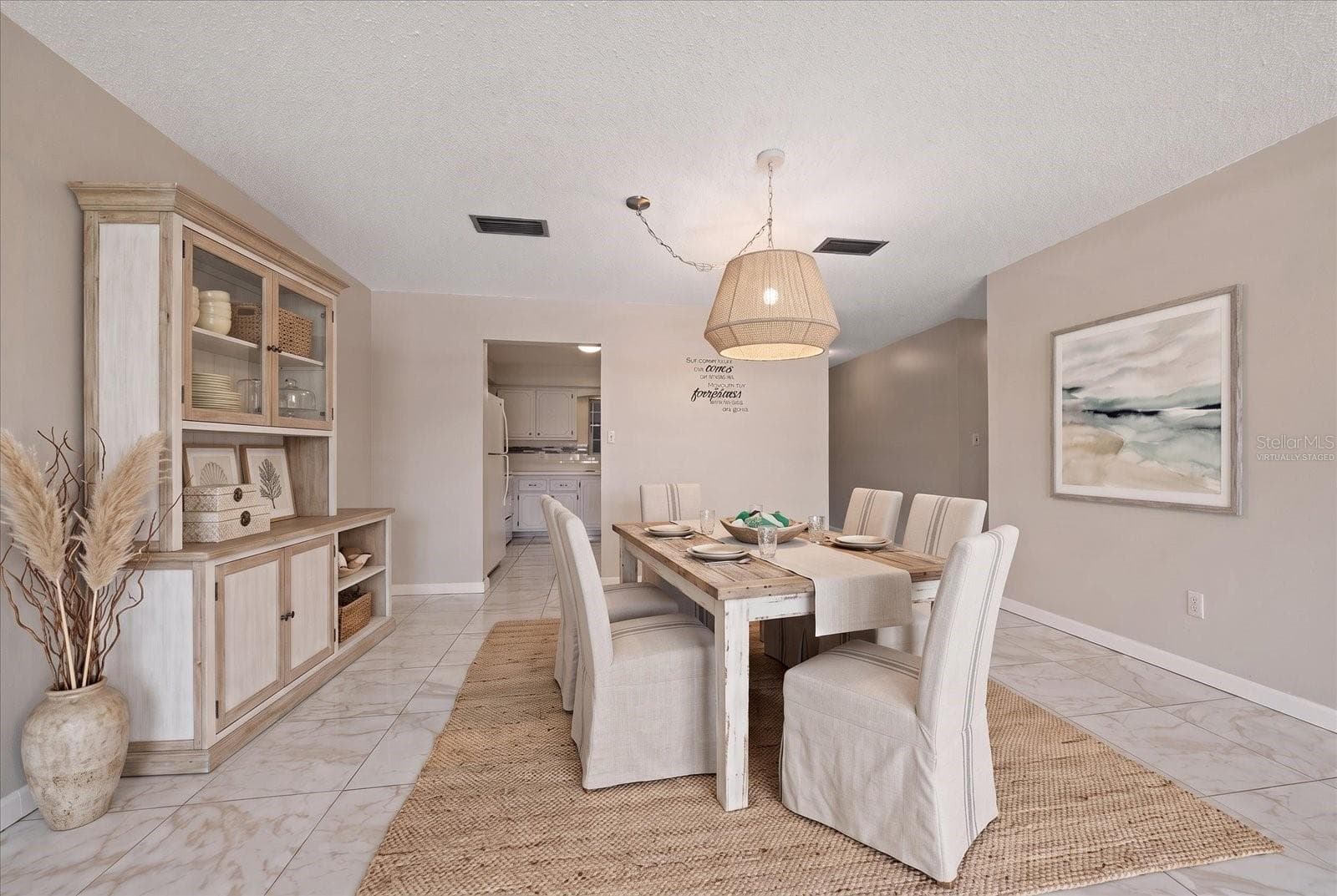 Dining room virtually staged - 1706 BELLEAIR FOREST DR #238, BELLEAIR