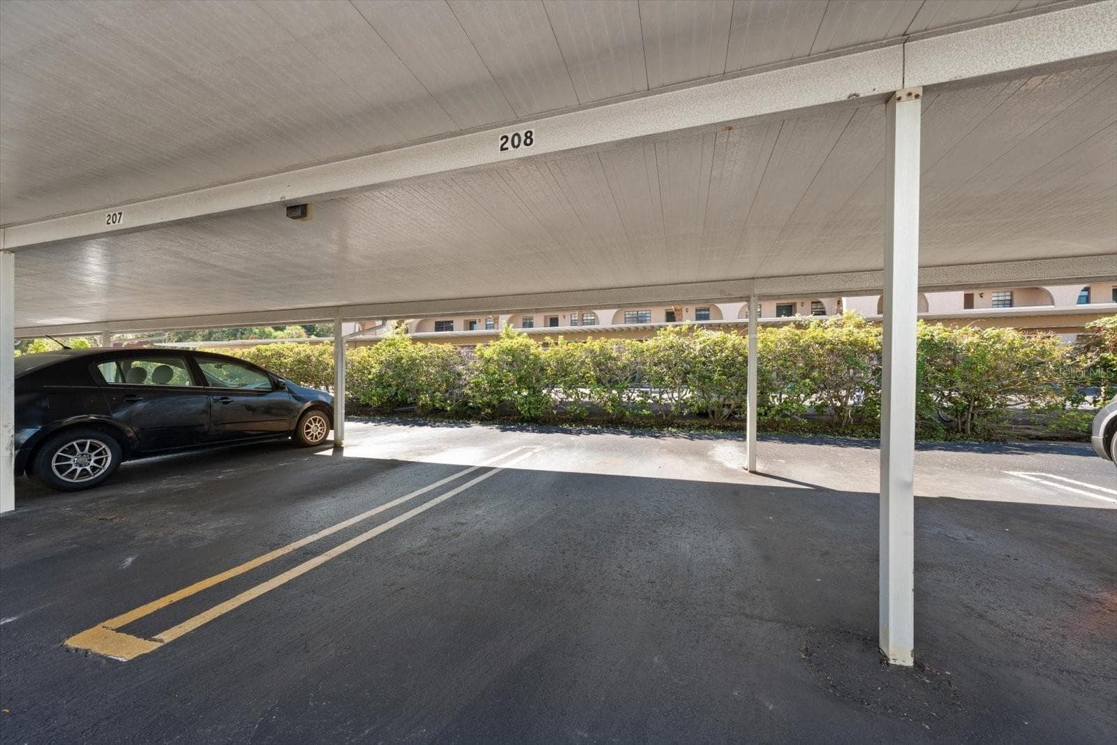 Covered carport #208 - 1706 BELLEAIR FOREST DR #238, BELLEAIR