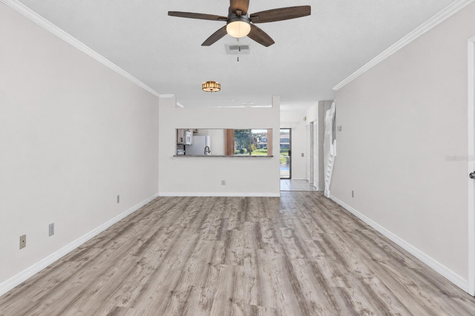 Open concept living area with Luxury Vinyl Plank -6229 Bayside Key Dr, Tampa, FL 33615 - 6229 BAYSIDE KEY DR, TAMPA