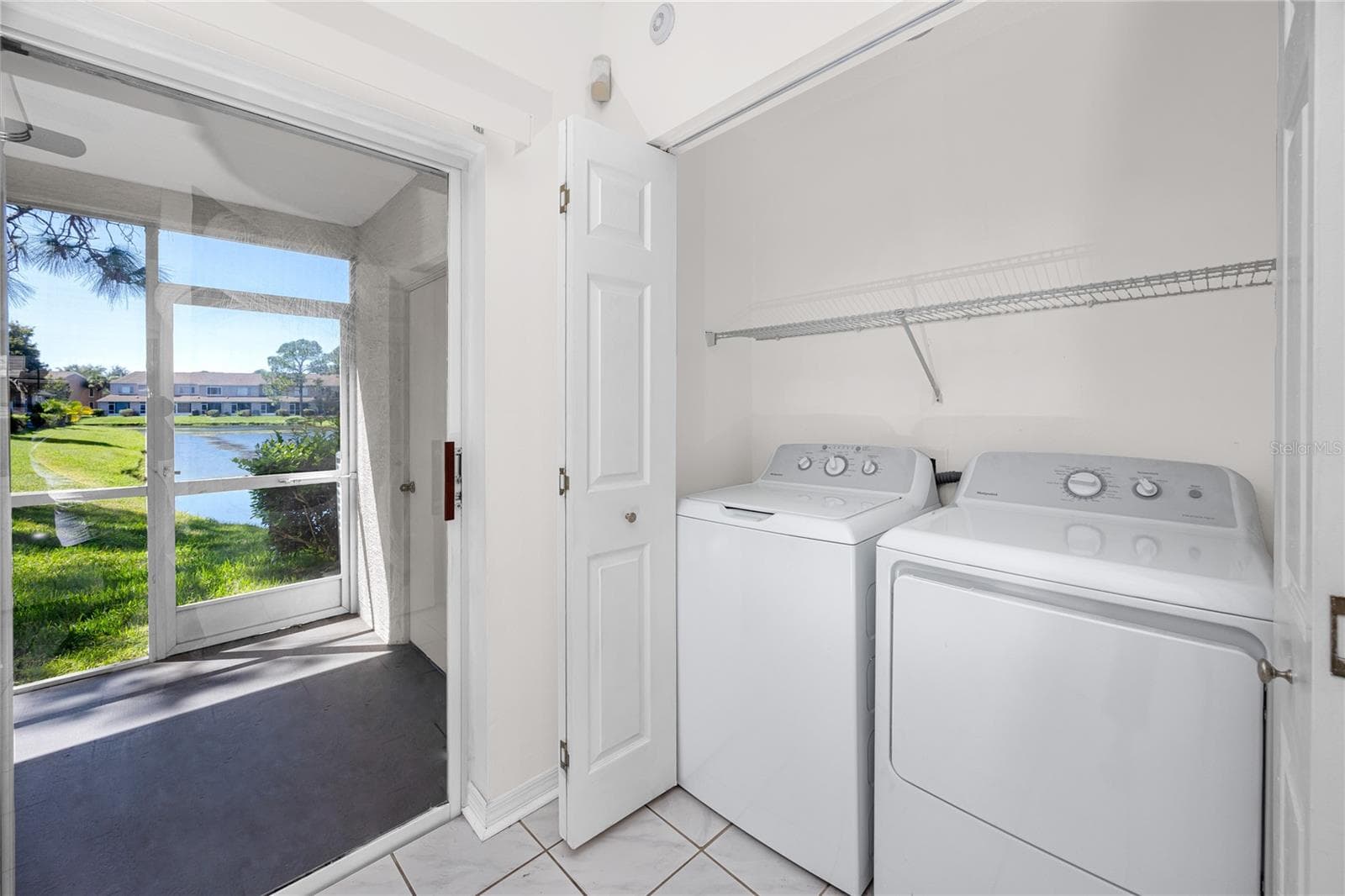 Laundry Closet with Full size washer and dryer -6229 Bayside Key Dr, Tampa, FL 33615 - 6229 BAYSIDE KEY DR, TAMPA