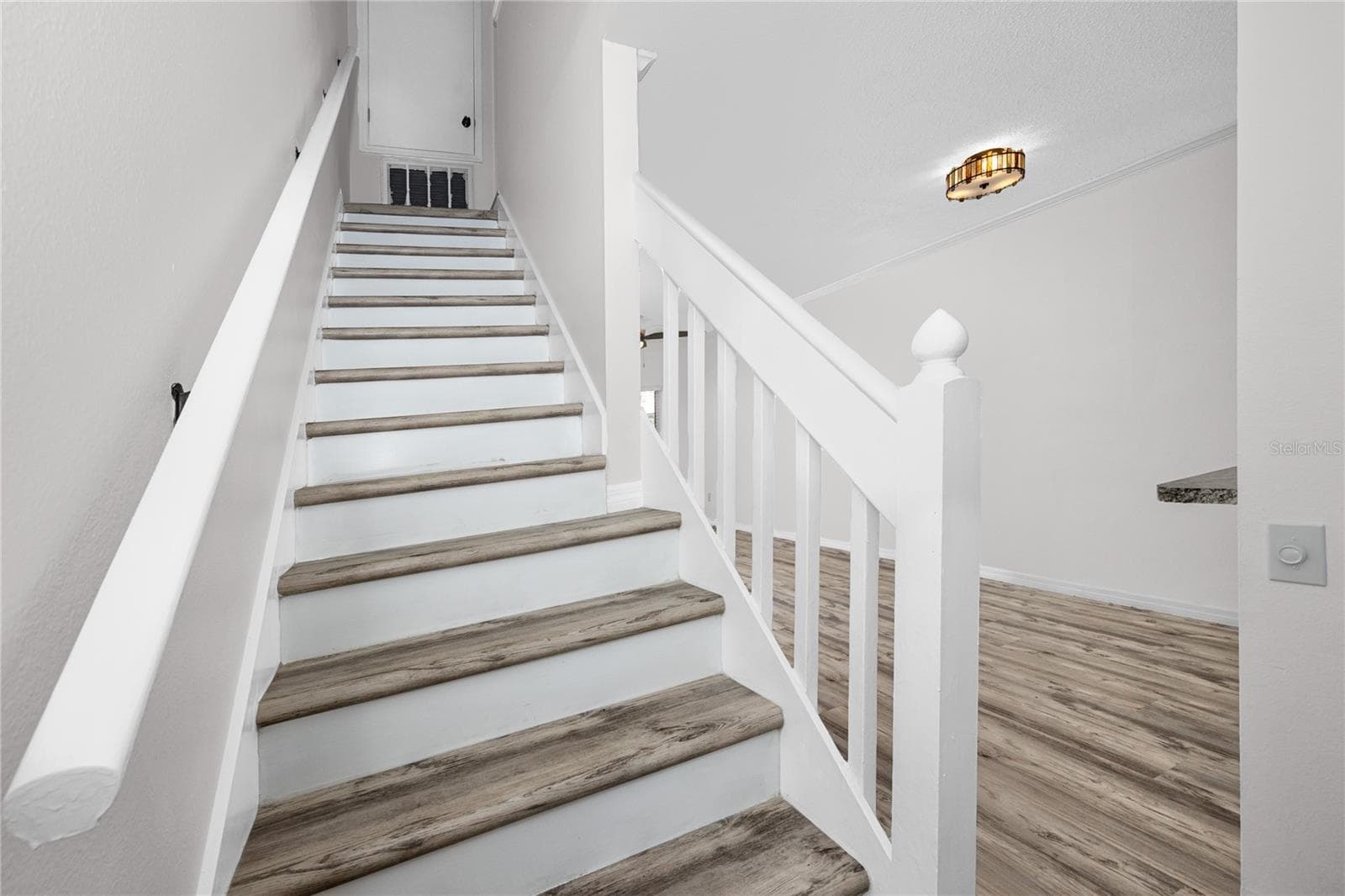Staircase with Luxury Vinyl Plank -6229 Bayside Key Dr, Tampa, FL 33615 - 6229 BAYSIDE KEY DR, TAMPA
