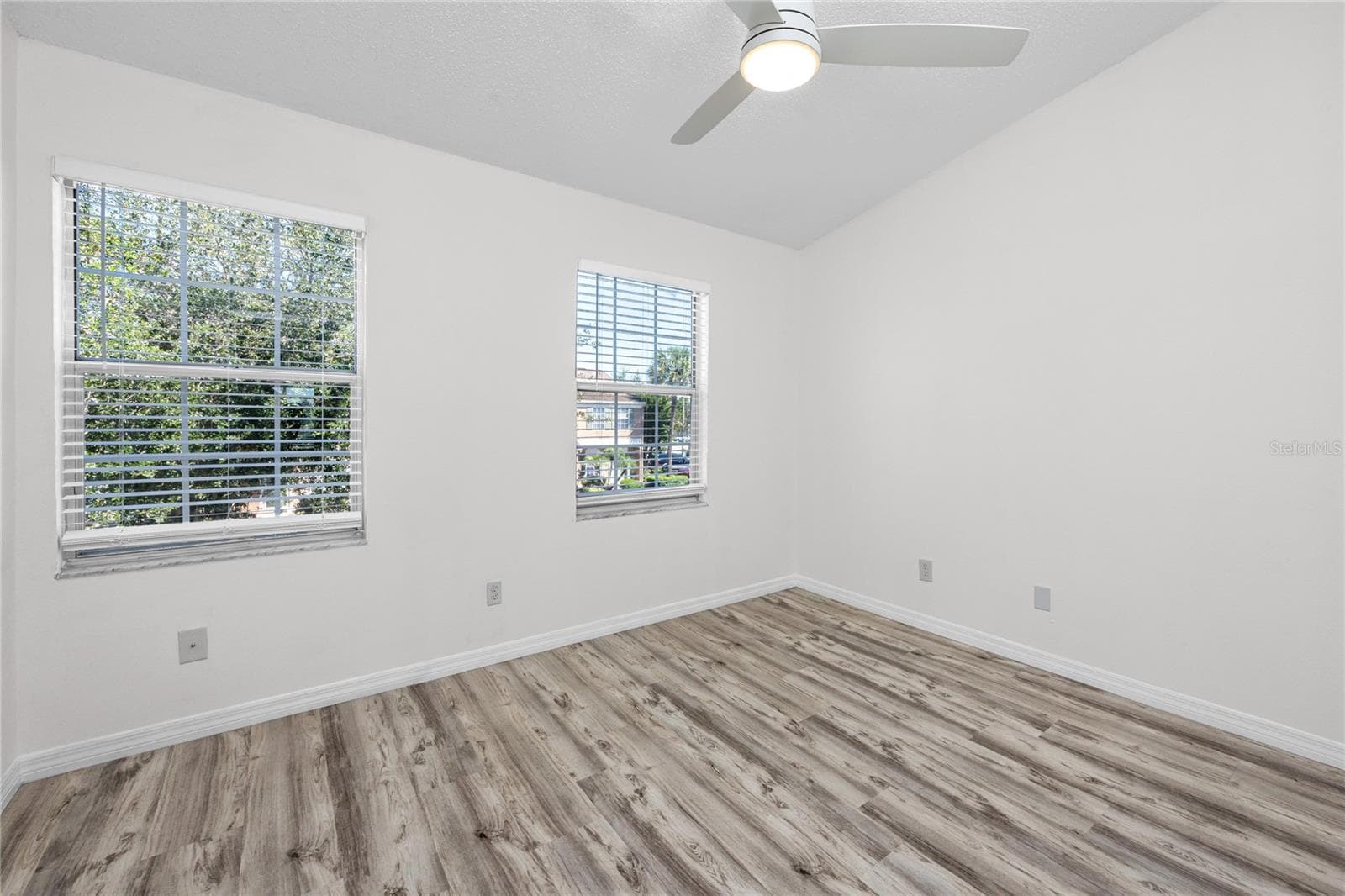 Second Bedroom with Ensuite Bath & LVP -6229 Bayside Key Dr, Tampa, FL 33615 - 6229 BAYSIDE KEY DR, TAMPA
