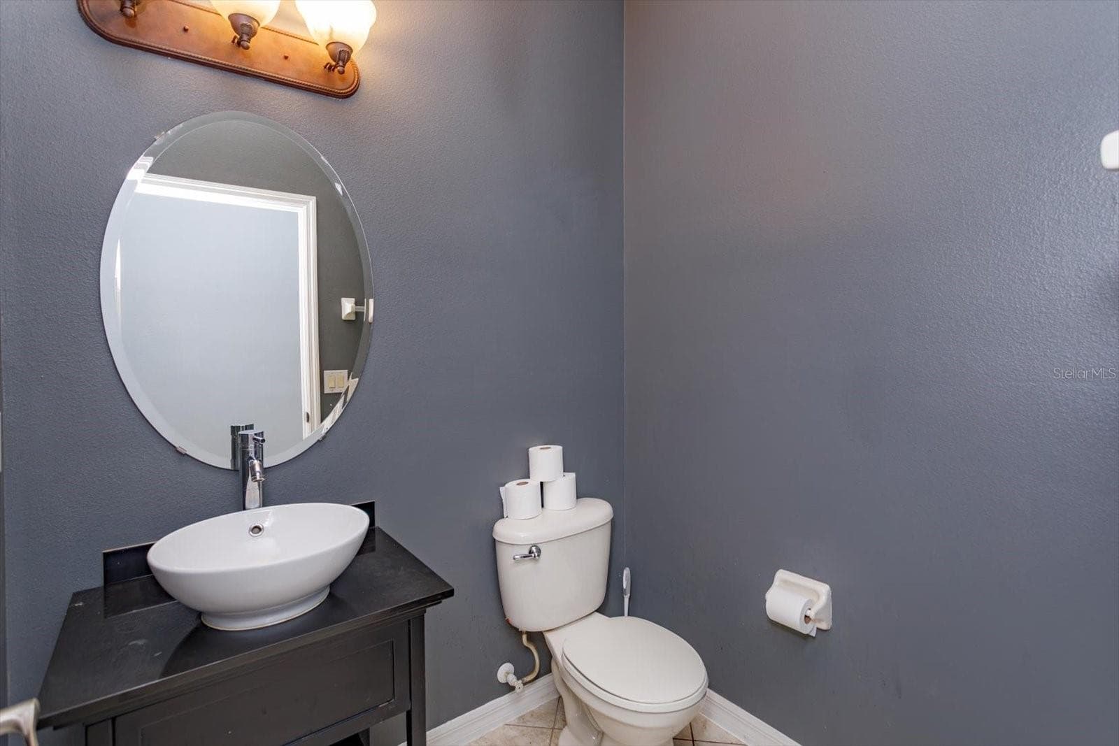Half bath on first floor - 7242 MYSTIC BROOK WAY, DAVENPORT