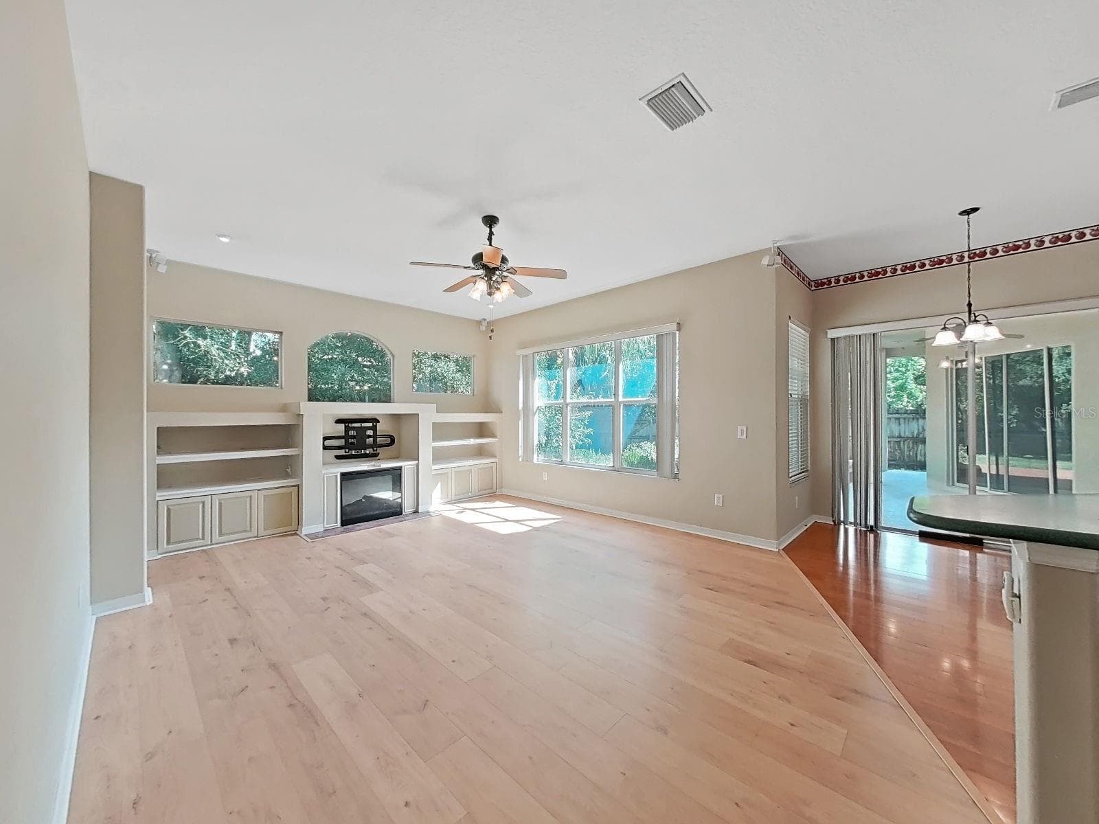 Family Room ~ Built-In Shelving ~ Bose Surround Sound Speakers - 14915 DEVONSHIRE WOODS PL, TAMPA