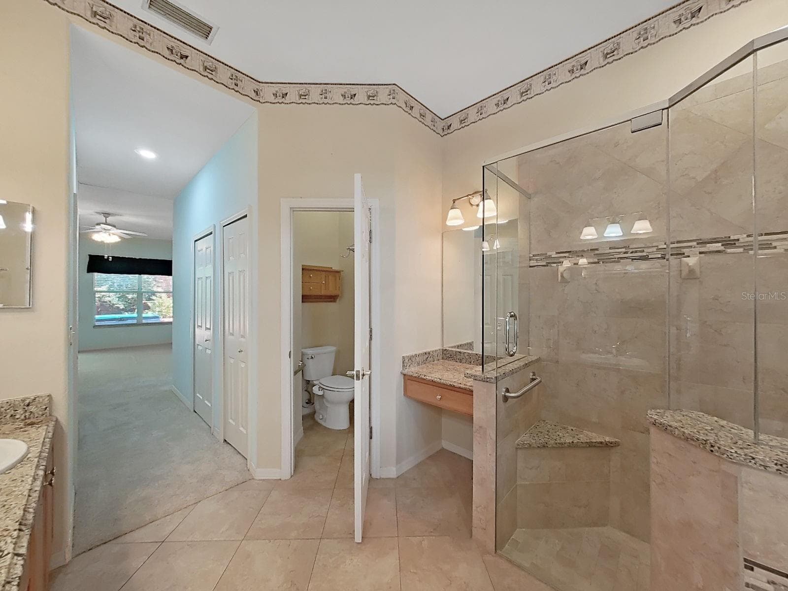 Private Water Closet ~ Bench in Shower - 14915 DEVONSHIRE WOODS PL, TAMPA