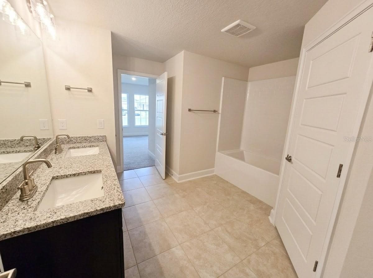 JACK & JILL BATHROOM - 7544 BENT TREE LOOP, ST CLOUD