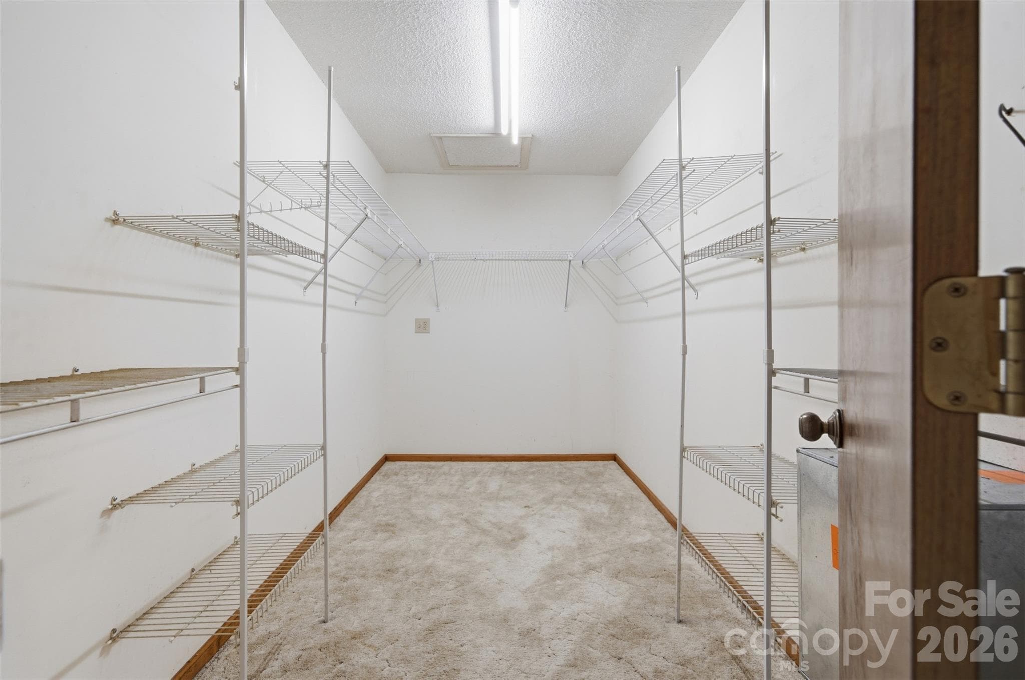 Primary Bedroom's Walk-in Closet - 8607 Wellington Lane, Harrisburg
